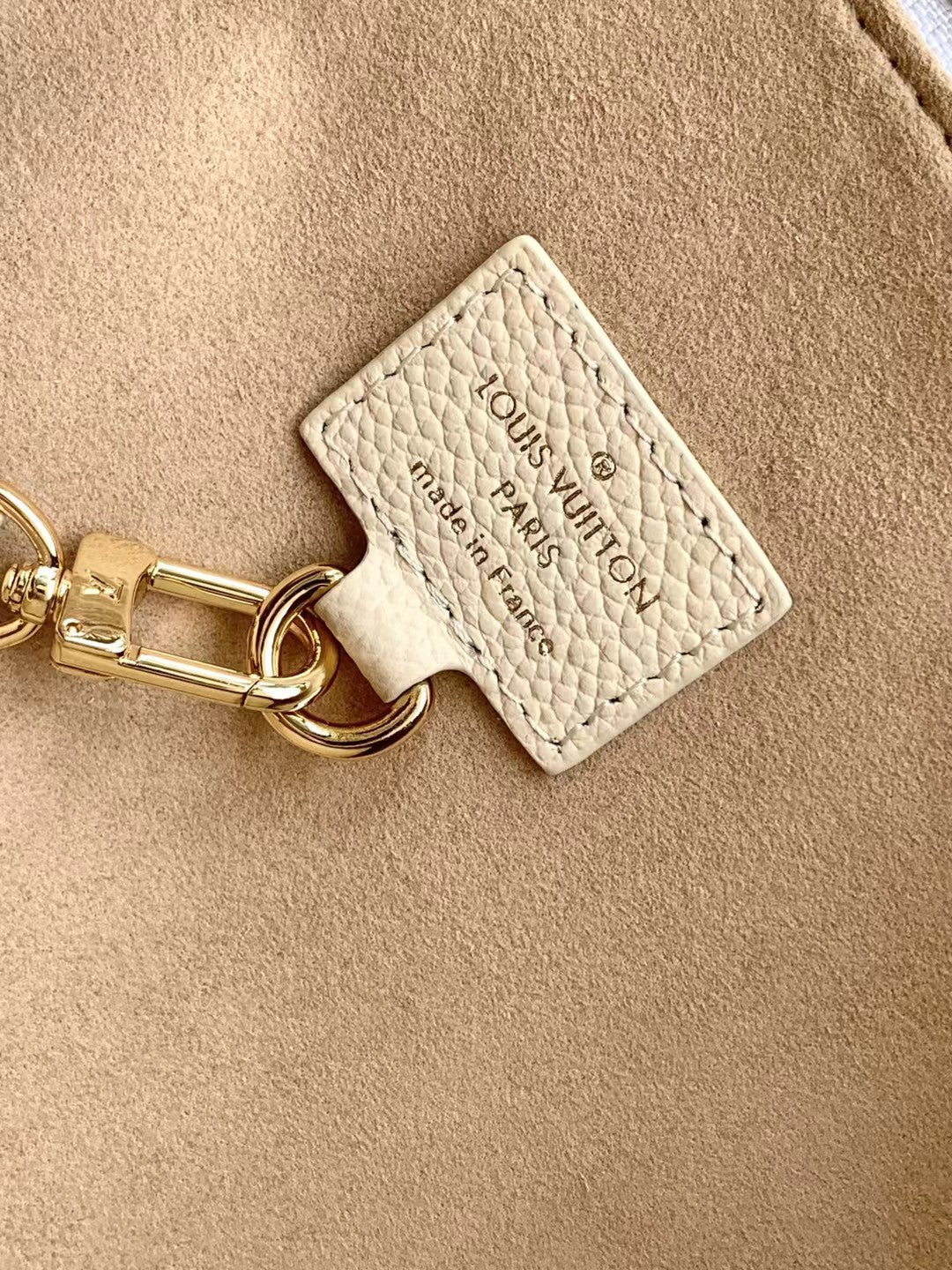 Louis Vuitton Bagatelle Monogram Empreinte Leather Shoulder Bag - Cream