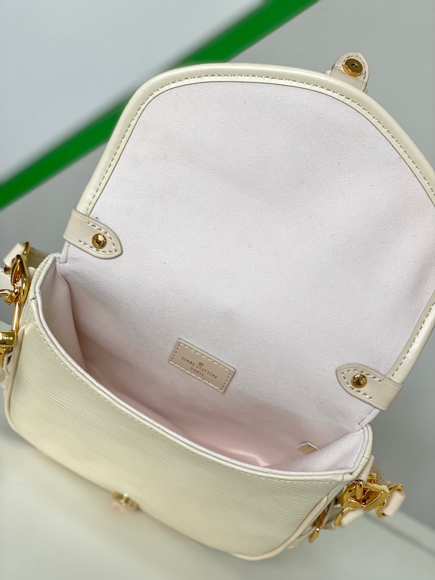 Louis Vuitton Elegant Pale Pink Leather Crossbody Saddle Bag with Gold Hardware