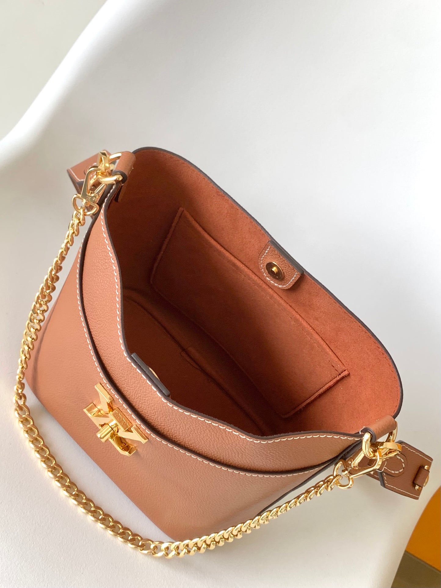 Louis Vuitton Classic Brown Leather Bucket Bag with Gold Chain Shoulder Strap