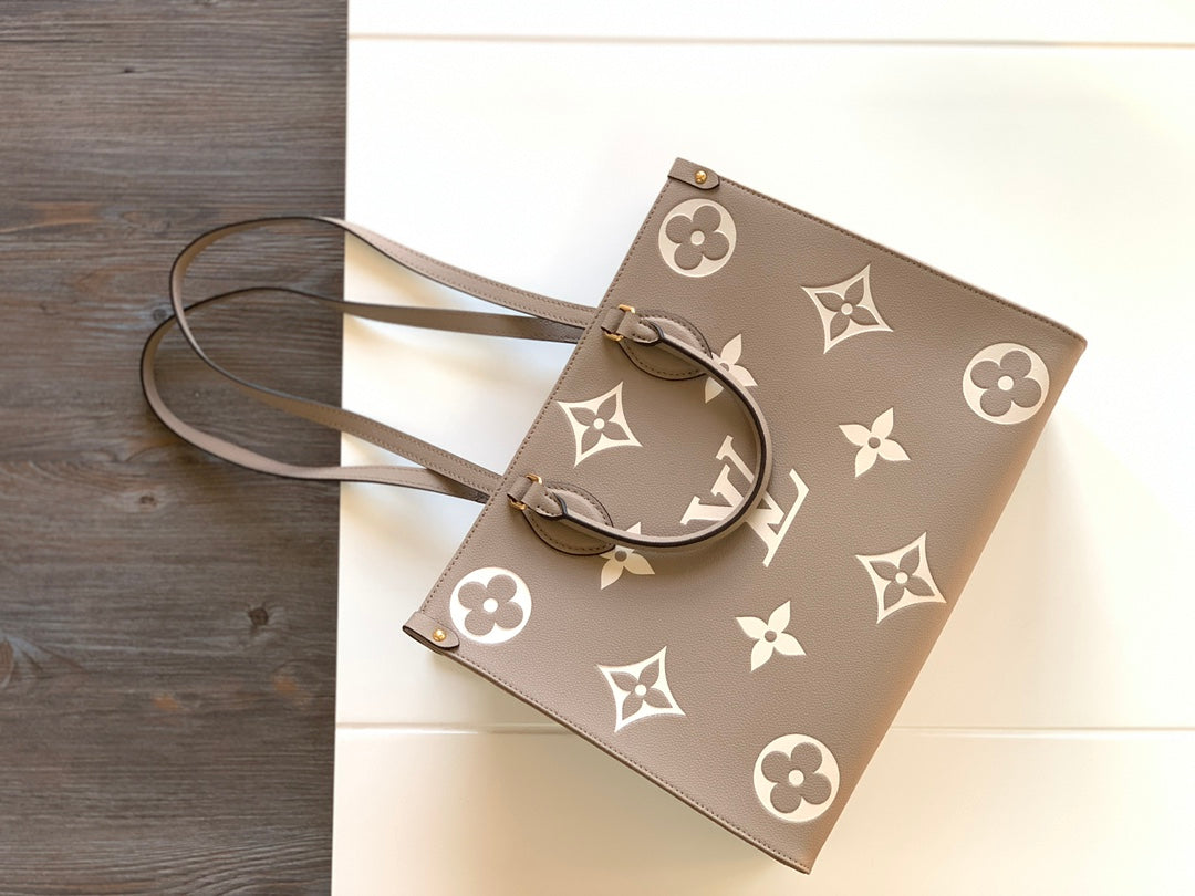 Louis Vuitton Elegant Taupe Leather Tote Bag with Large Embossed Monogram