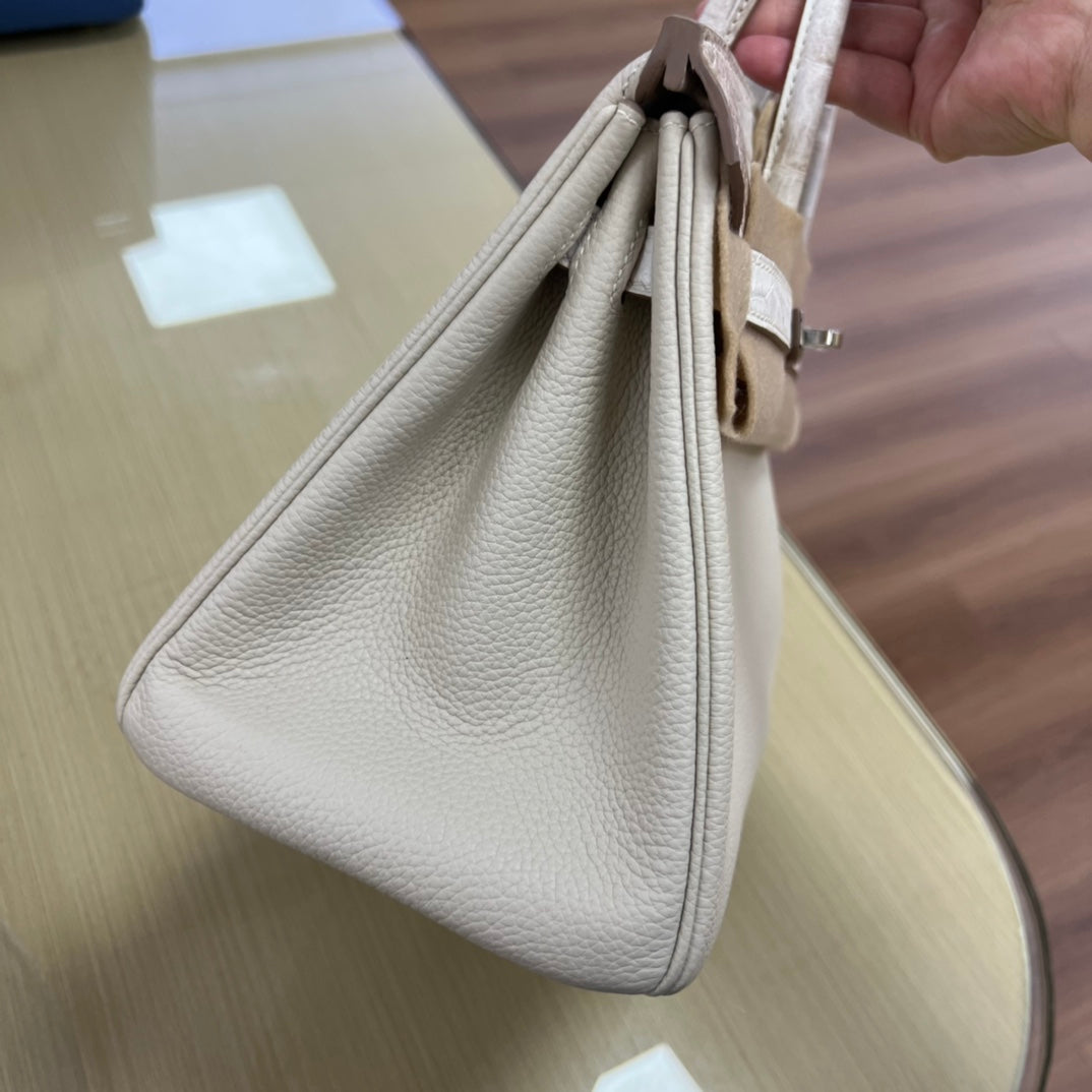 Elegant Cream Leather Top Handle Handbag with Textured Accents