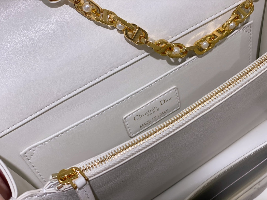 Dior Elegant White Quilted Leather Handbag with Gold Chain Strap