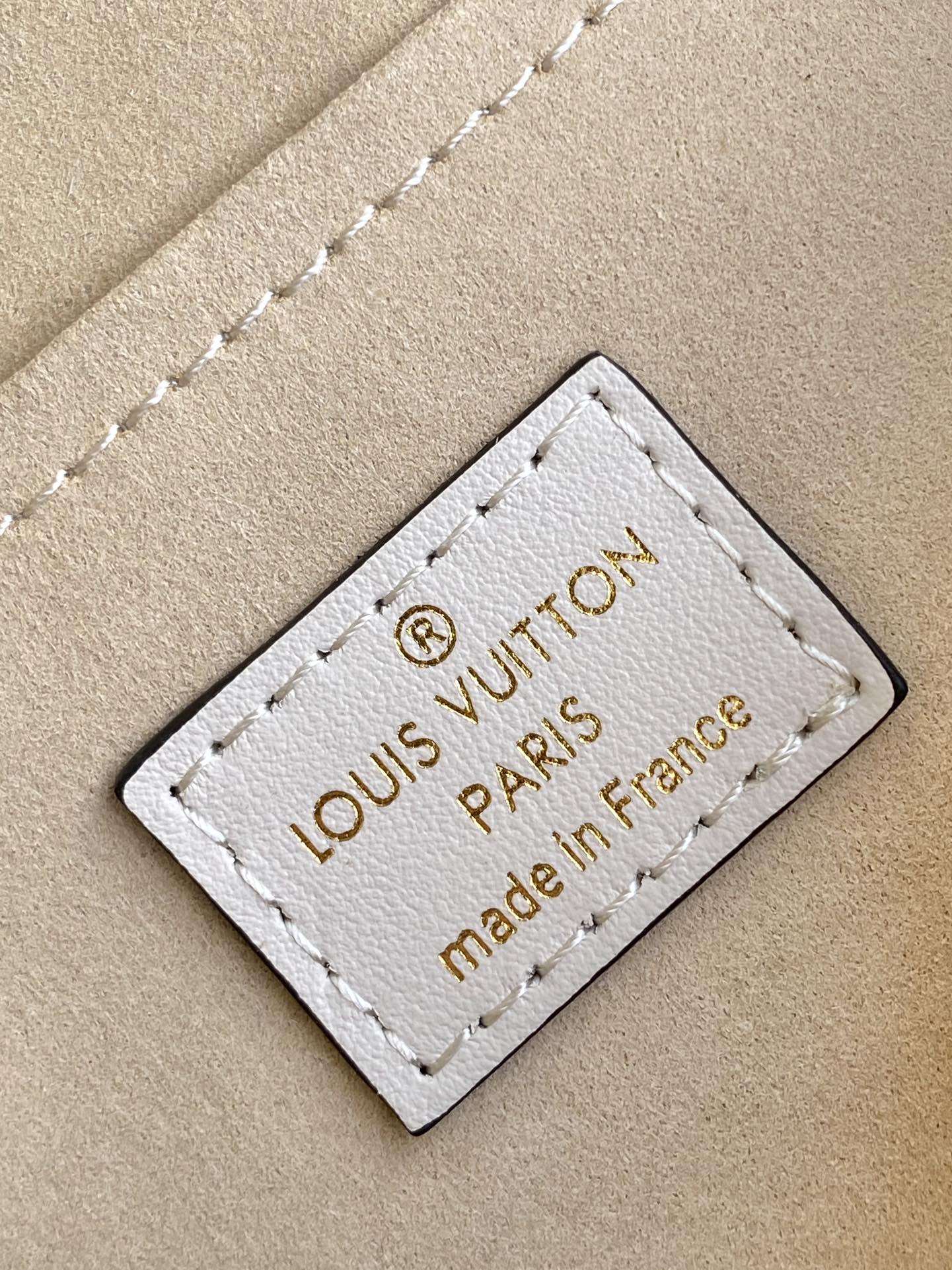 Louis Vuitton White Embossed Leather Top Handle Mini Crossbody Duffle Bag