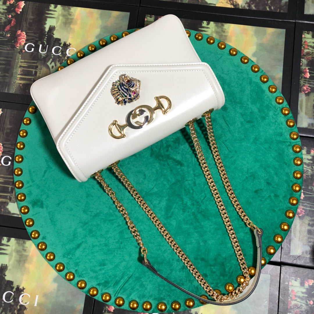 Gucci Elegant White Leather Envelope Shoulder Bag with Gold Tiger Head