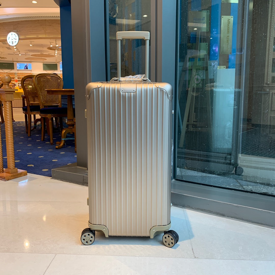 Champagne Gold Ribbed Hardside Spinner Luggage Suitcase