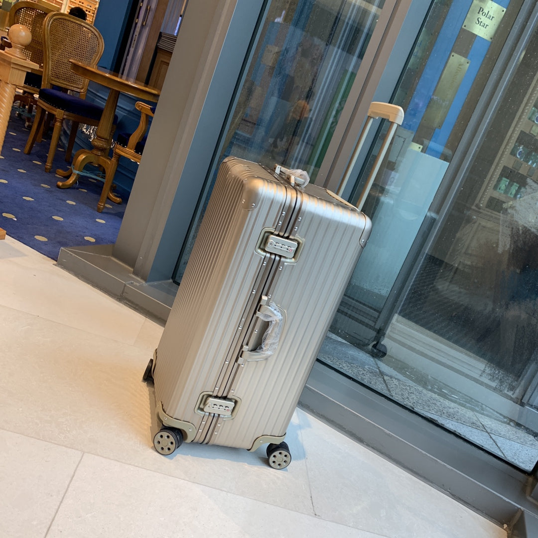 Champagne Gold Ribbed Hardside Spinner Luggage Suitcase