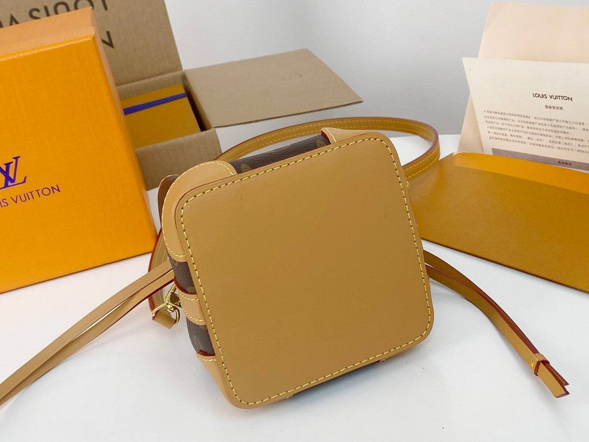 Louis Vuitton Vintage Brown Monogram Mini Bucket Bag with Tan Leather Trim