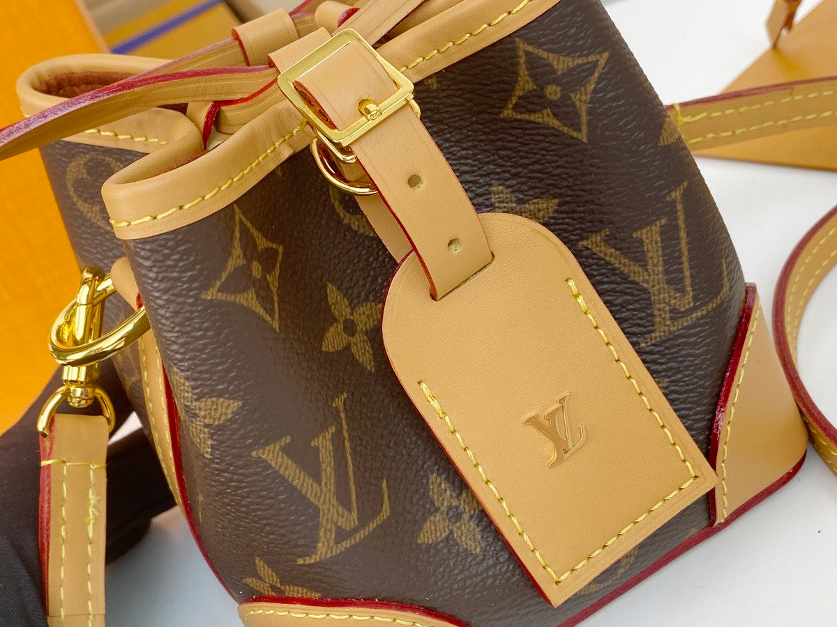 Louis Vuitton Vintage Brown Monogram Mini Bucket Bag with Tan Leather Trim