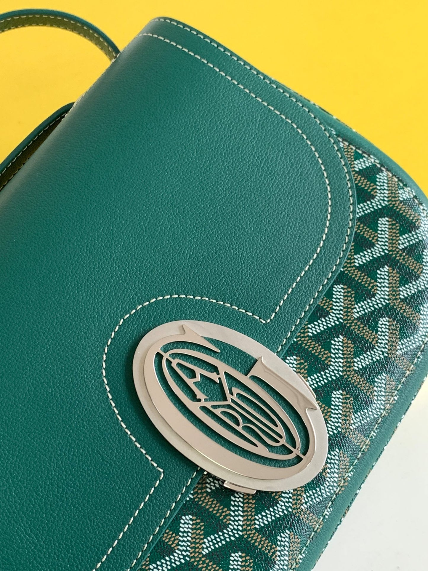 Gogy Classic Green Leather Crossbody Bag with Chevron Pattern and Silver Buckle