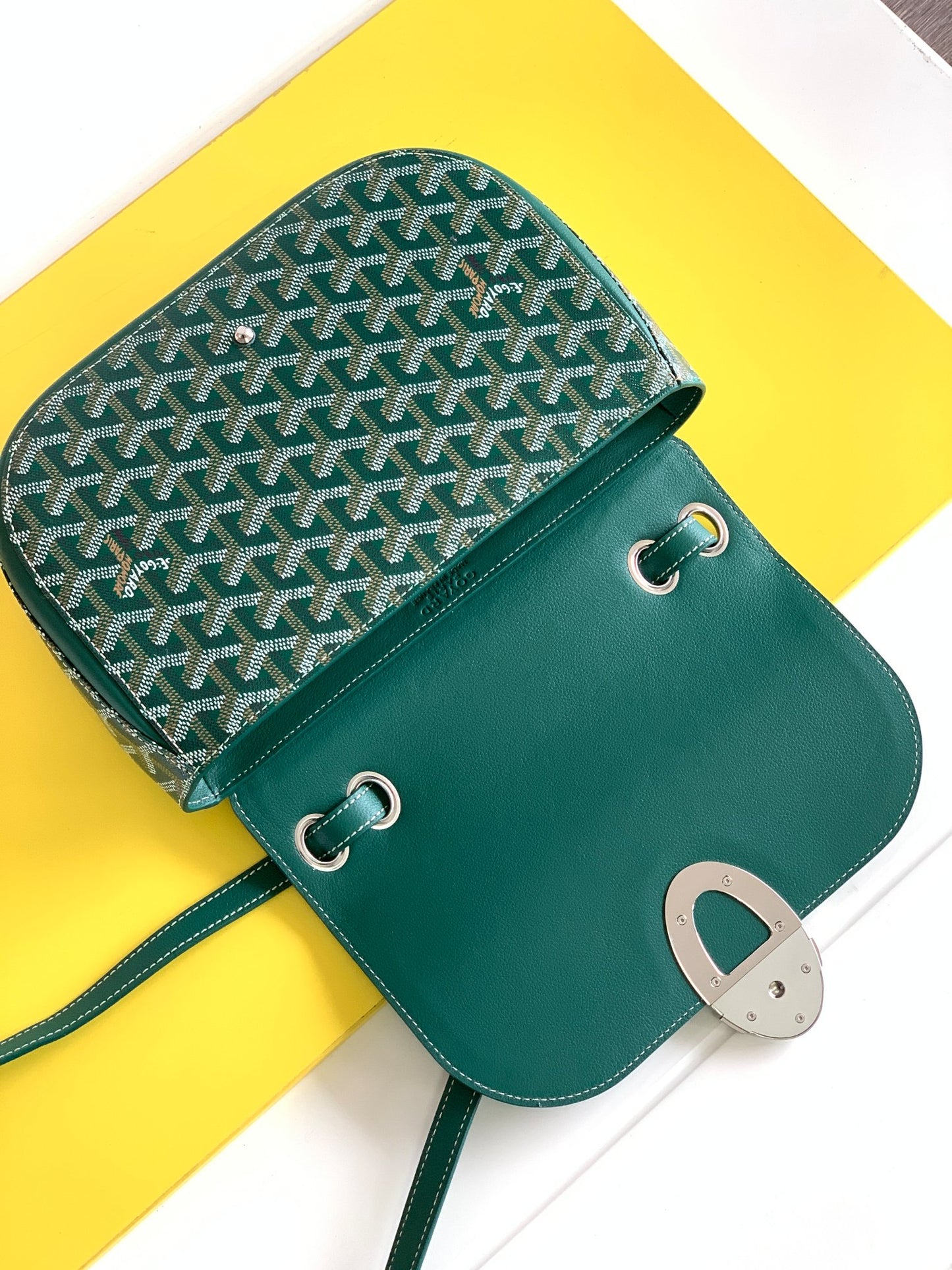 Gogy Classic Green Leather Crossbody Bag with Chevron Pattern and Silver Buckle