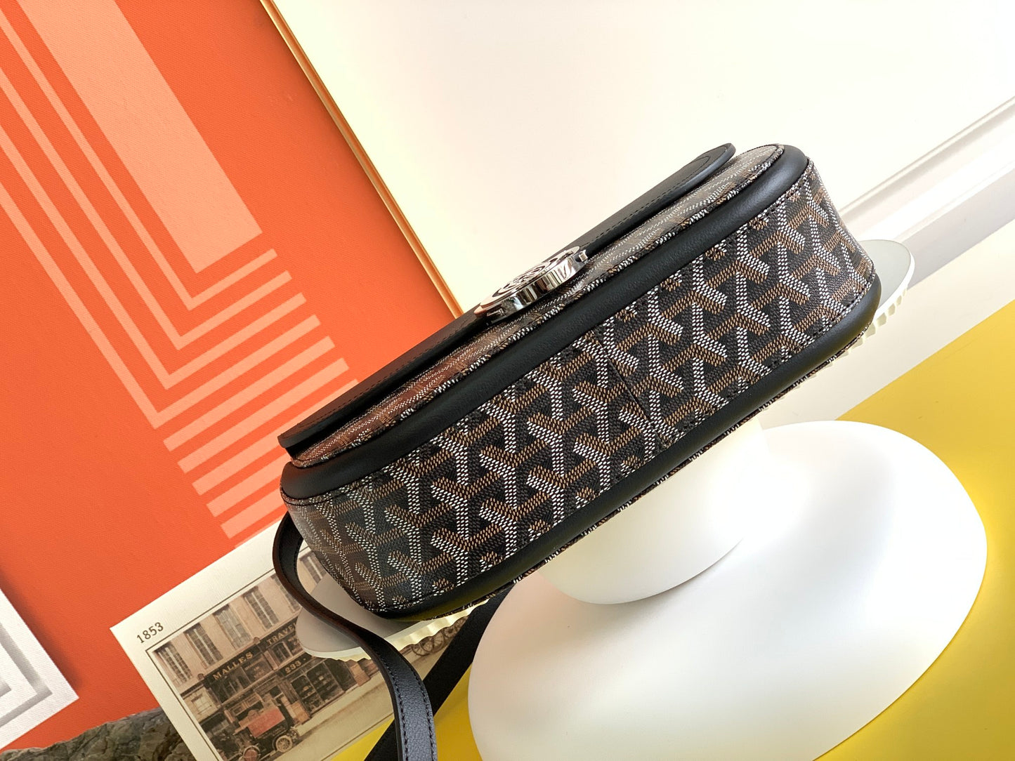 Gogy Black Leather Crossbody Bag with Chevron Monogram Print and Oval Clasp