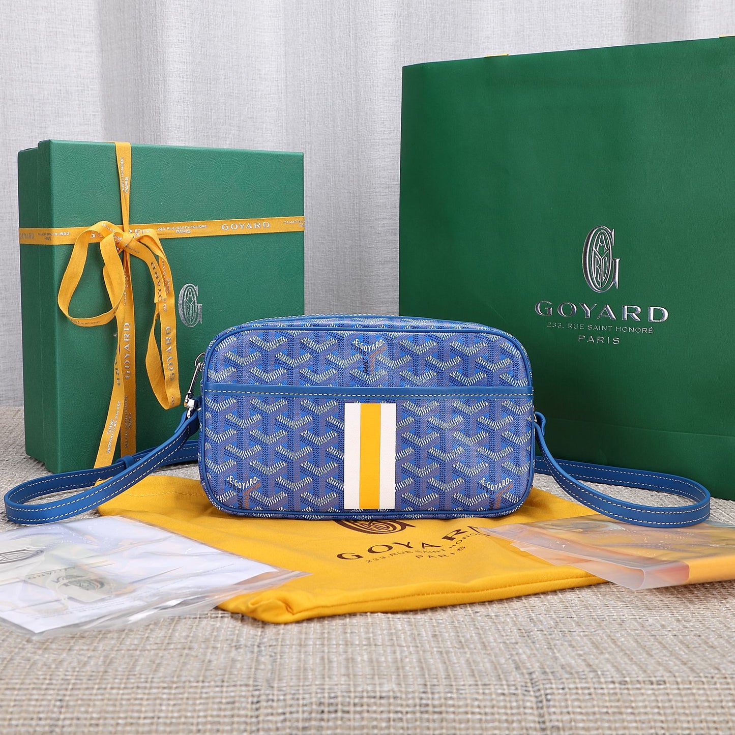 Gogy Blue Chevron Print Leather Crossbody Bag with Stripe Detail