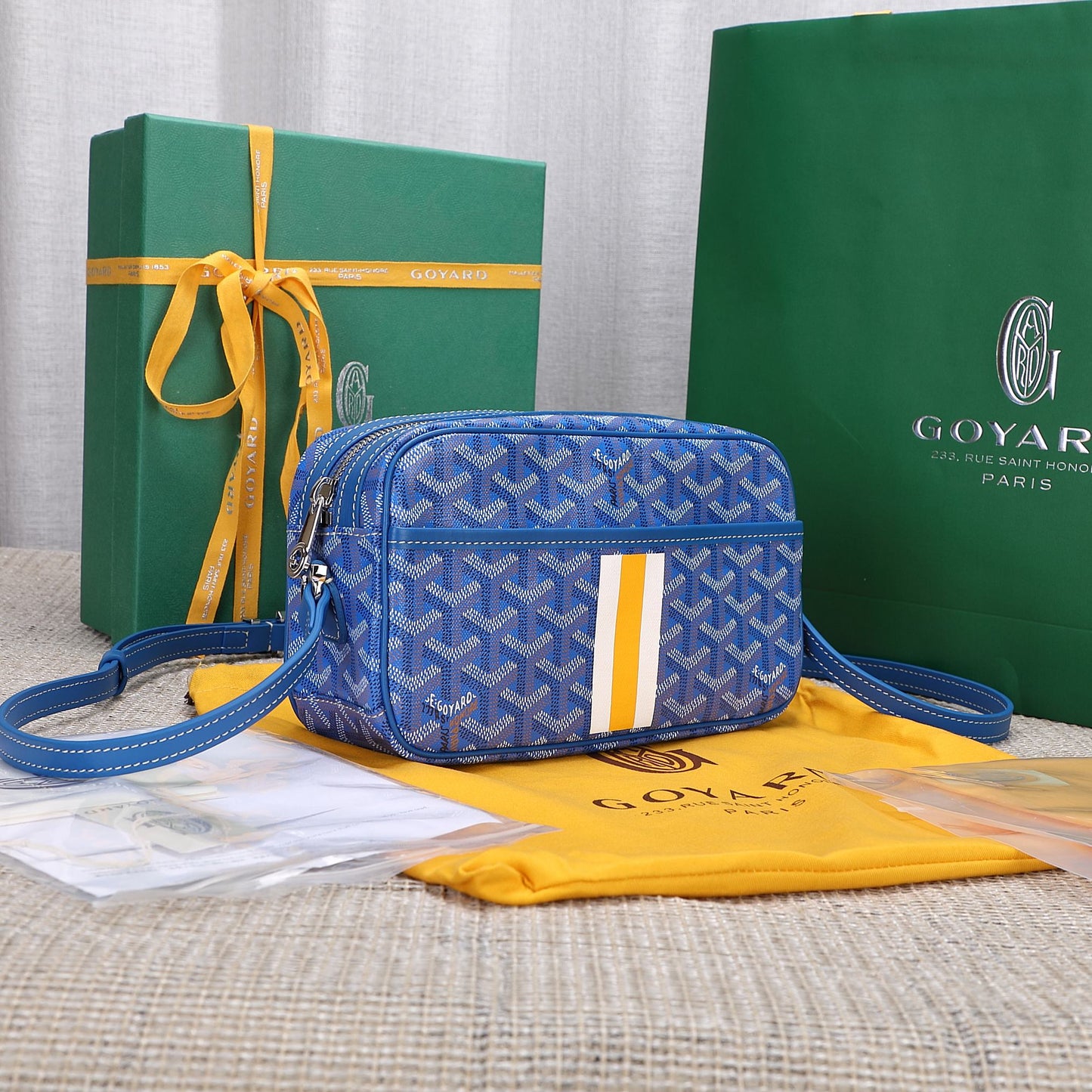 Gogy Blue Chevron Print Leather Crossbody Bag with Stripe Detail