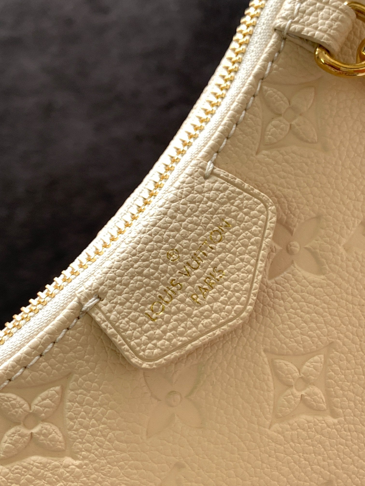 Louis Vuitton Elegant Cream Embossed Vegan Leather Underarm Bag with Gold Chain