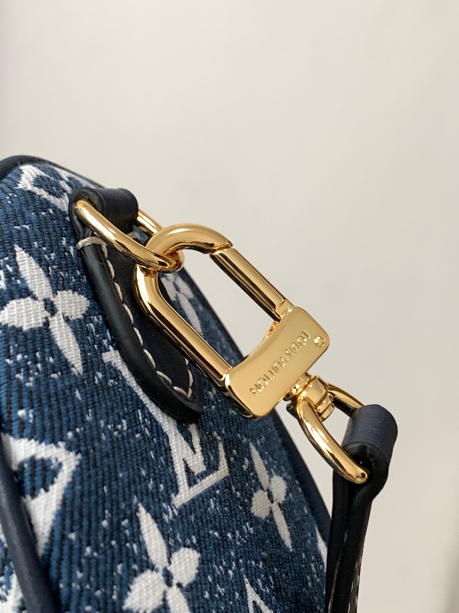 Louis Vuitton Mini Blue Denim Monogram Duffle Handbag with Crossbody Strap
