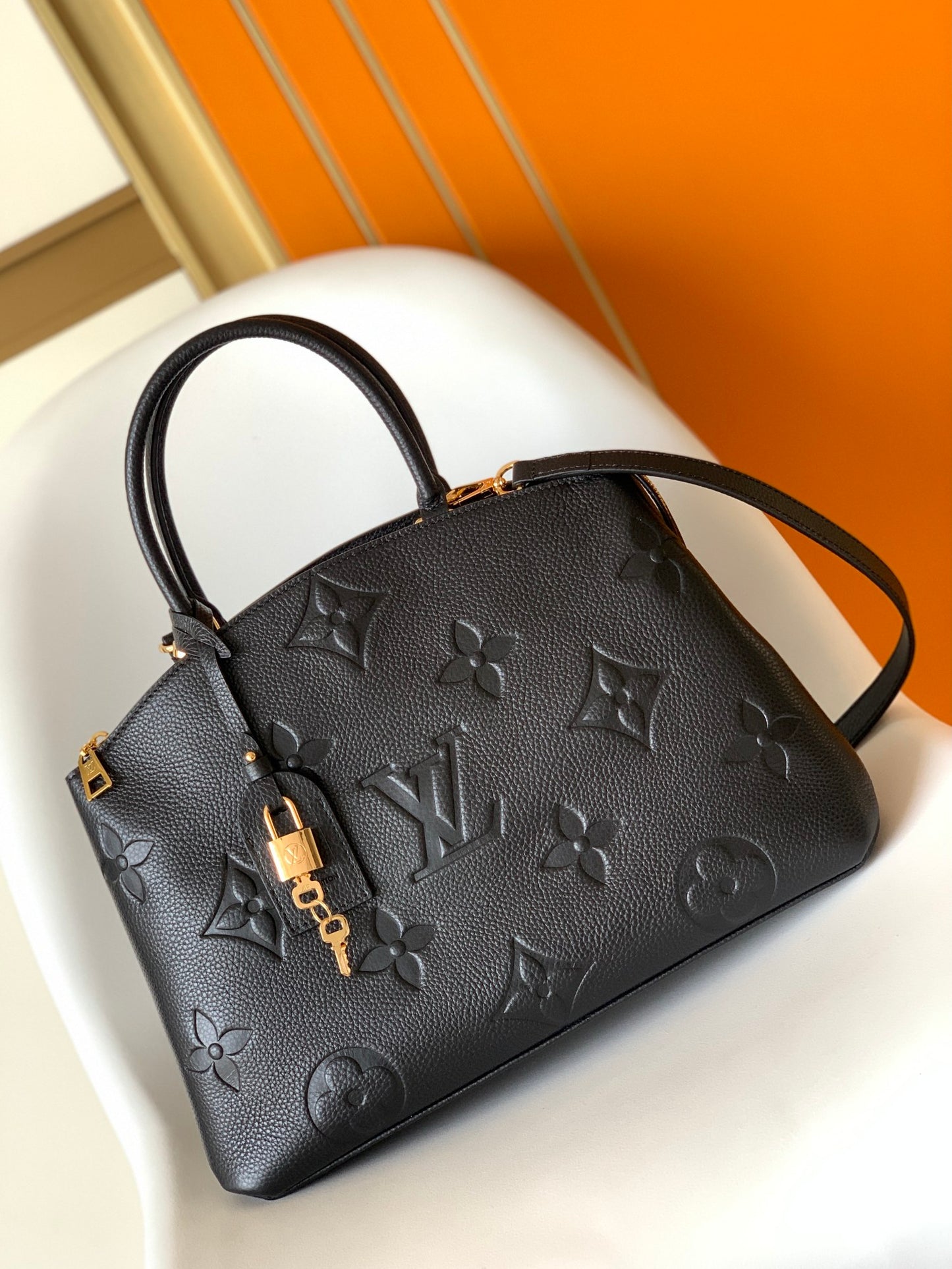 Louis Vuitton Elegant Black Embossed Leather Top Handle Satchel Bag