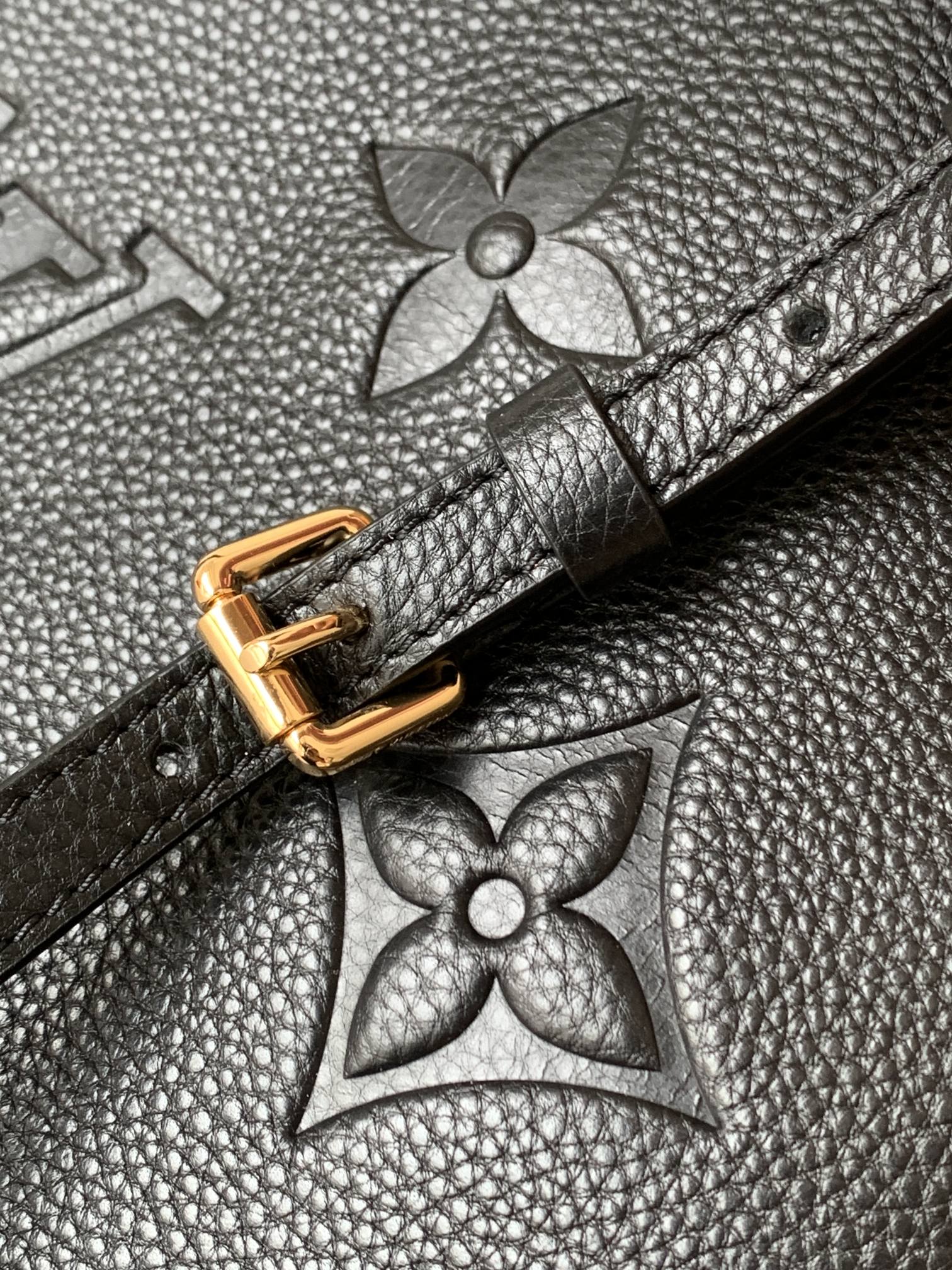 Louis Vuitton Elegant Black Embossed Leather Top Handle Satchel Bag