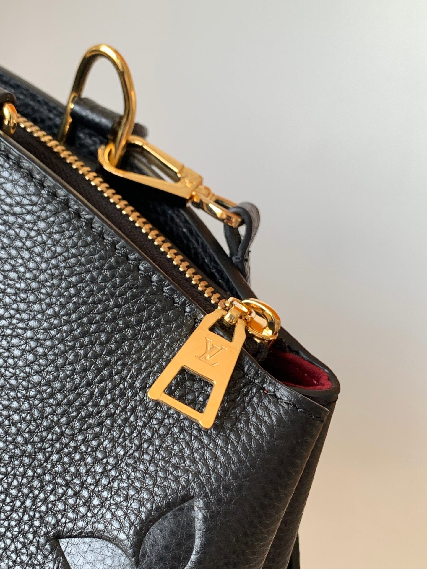 Louis Vuitton Elegant Black Embossed Leather Top Handle Satchel Bag
