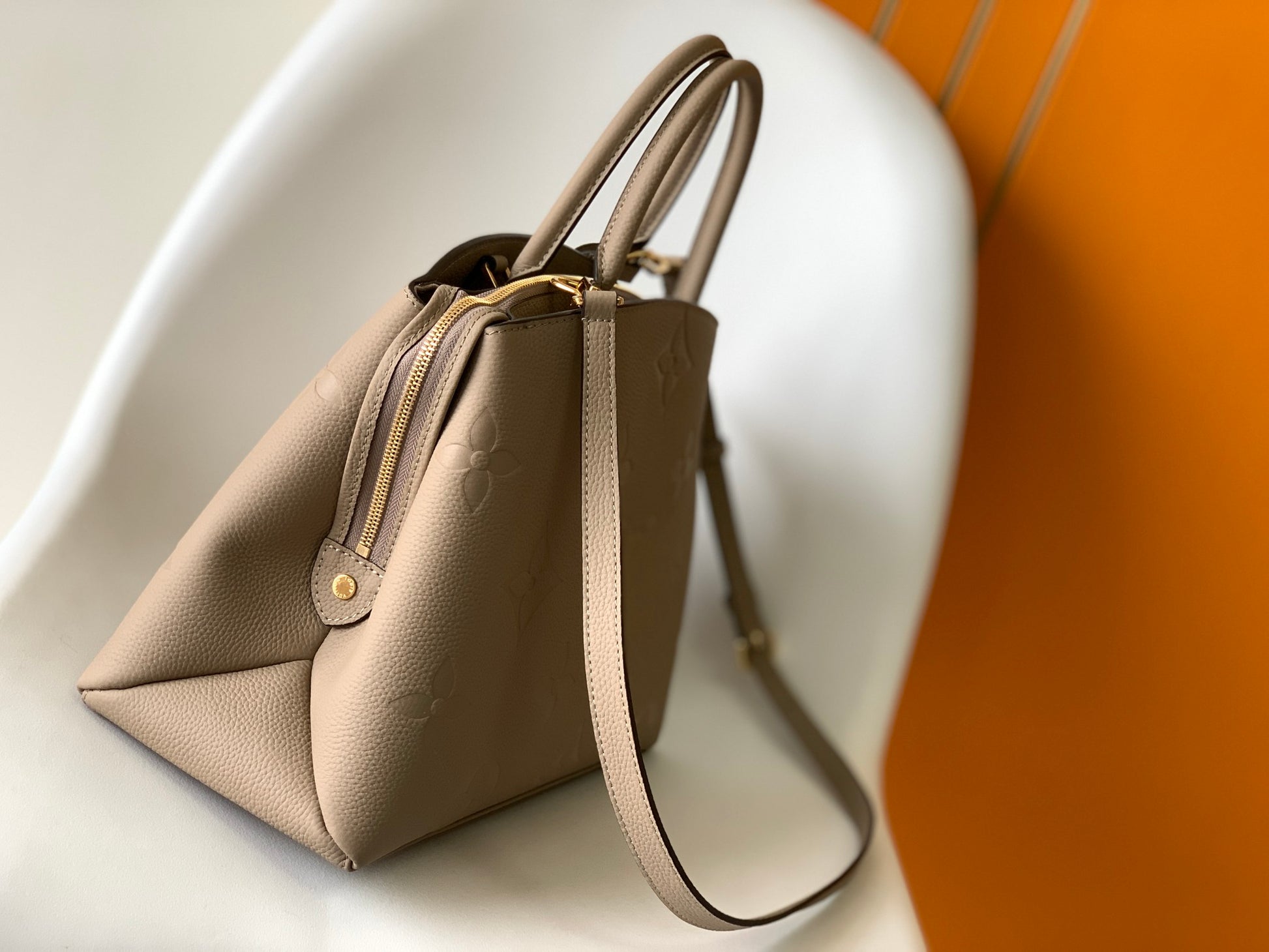 Louis Vuitton Elegant Taupe Embossed Leather Satchel Handbag with Lock Charm