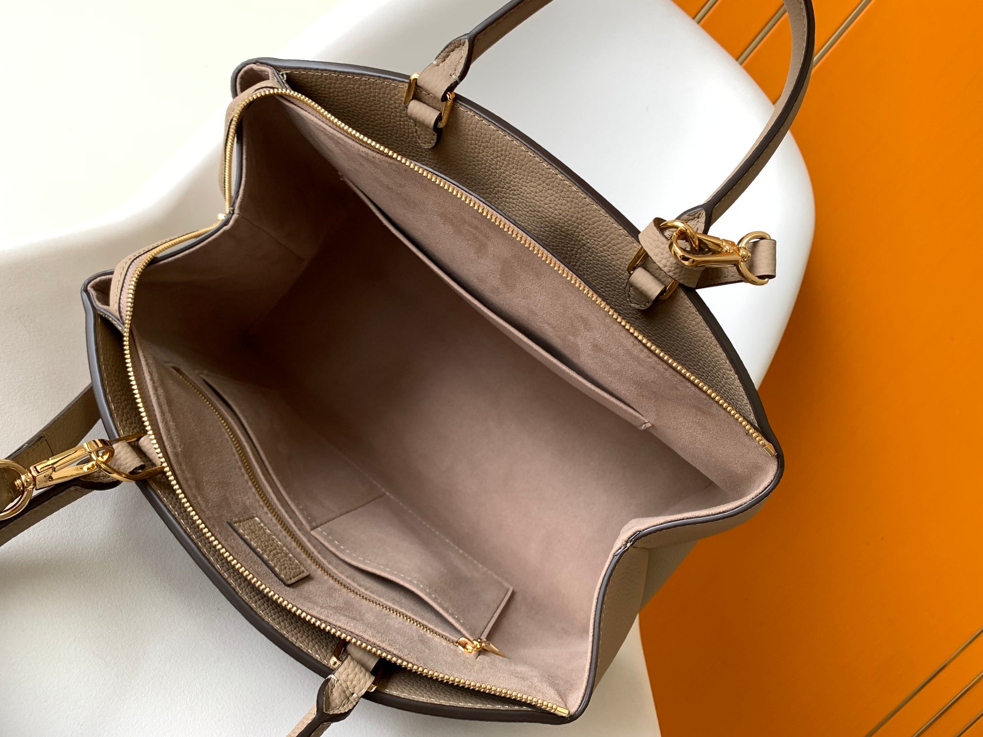 Louis Vuitton Elegant Taupe Embossed Leather Satchel Handbag with Lock Charm
