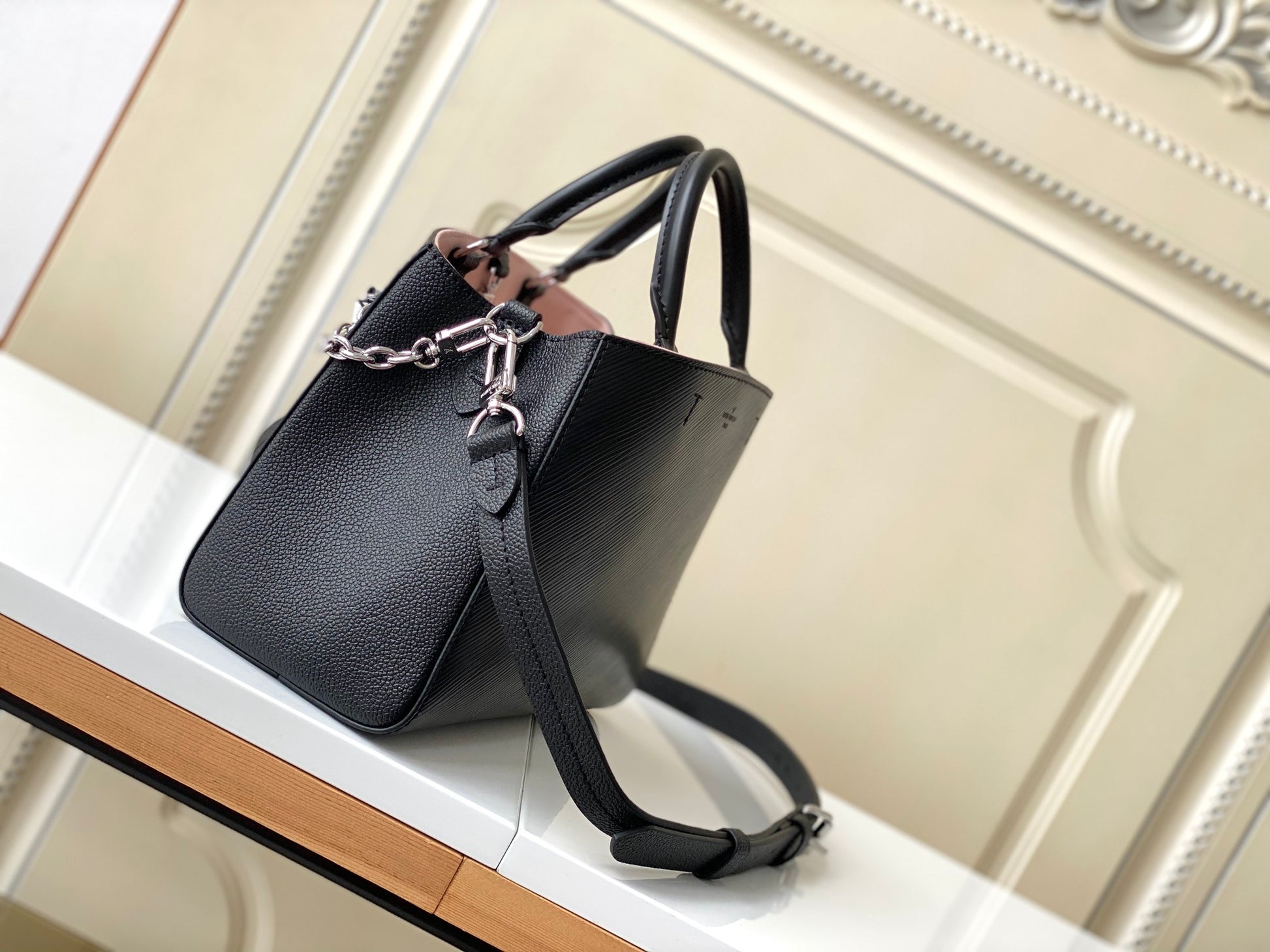 Louis Vuitton Black Top Handle Handbag with Silver Chain and Patterned Front Pocket