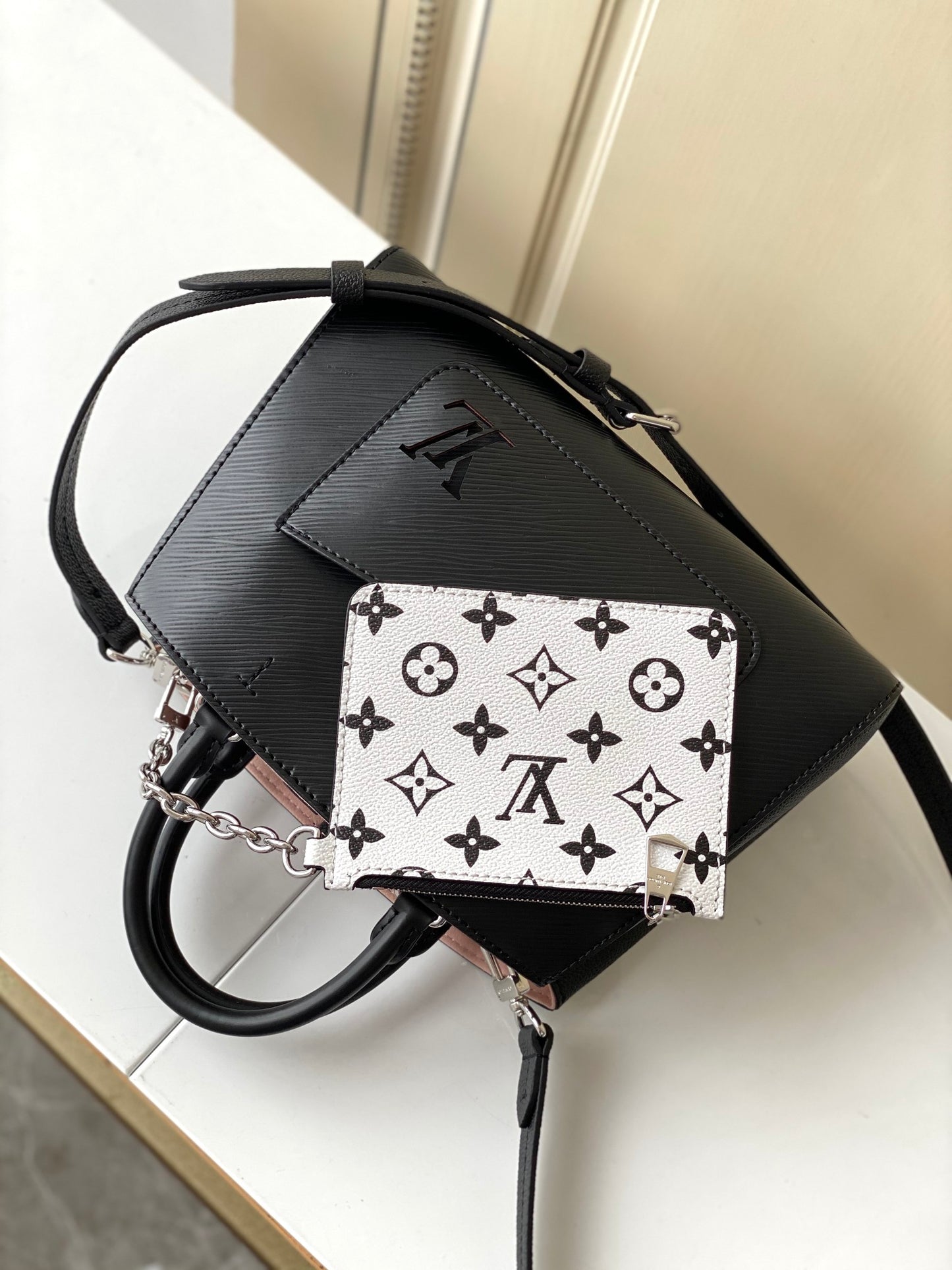 Louis Vuitton Black Top Handle Handbag with Silver Chain and Patterned Front Pocket