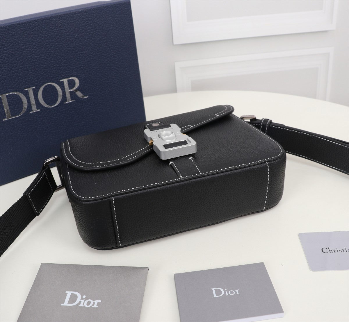 Dior Black Leather Crossbody Bag with Contrast Stitching and Buckle Clasp