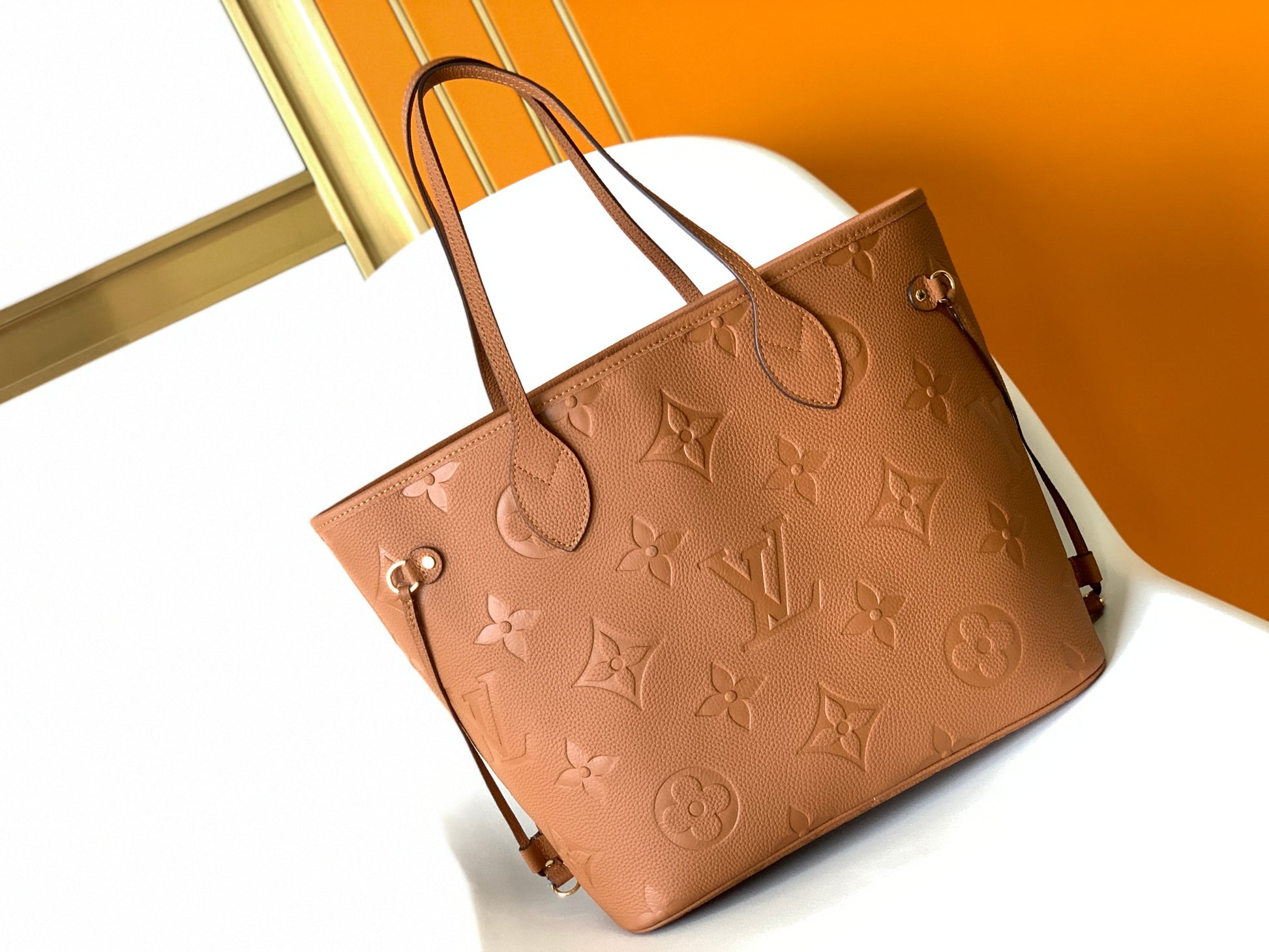 Louis Vuitton Classic Brown Embossed Leather Tote Bag with Side Drawstrings