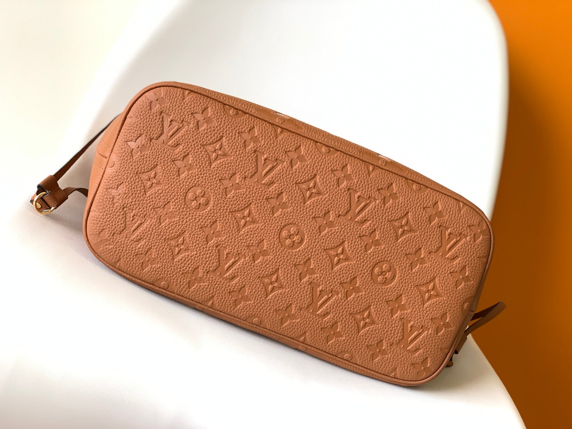 Brown Floral Embossed Leather Tote Bag with Side Drawstrings