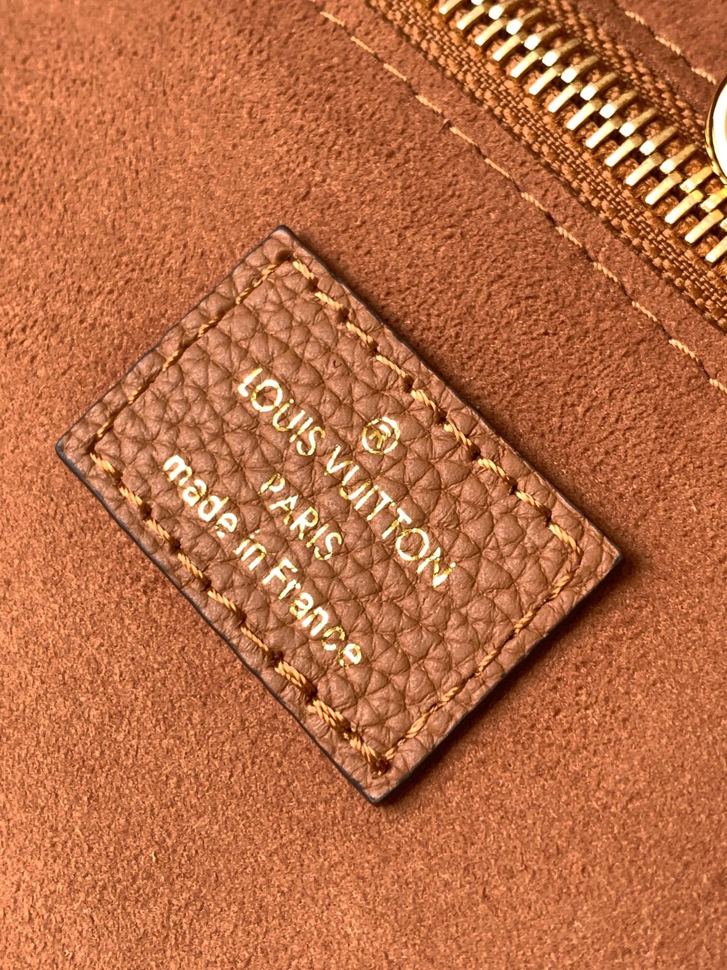 Louis Vuitton Classic Brown Embossed Leather Tote Bag with Side Drawstrings