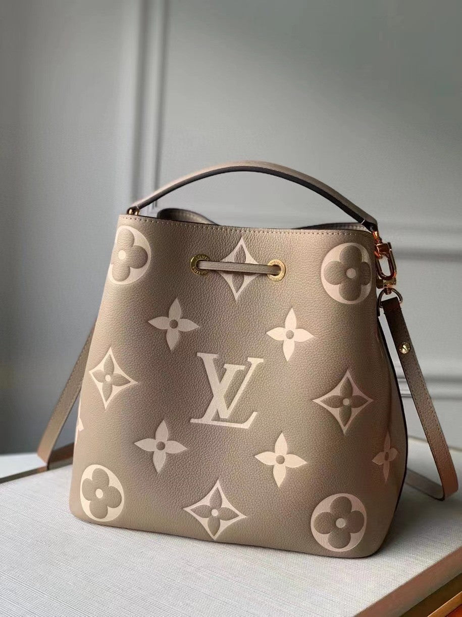 Louis Vuitton Elegant Taupe Monogram Leather Bucket Bag and Matching Pouch Set