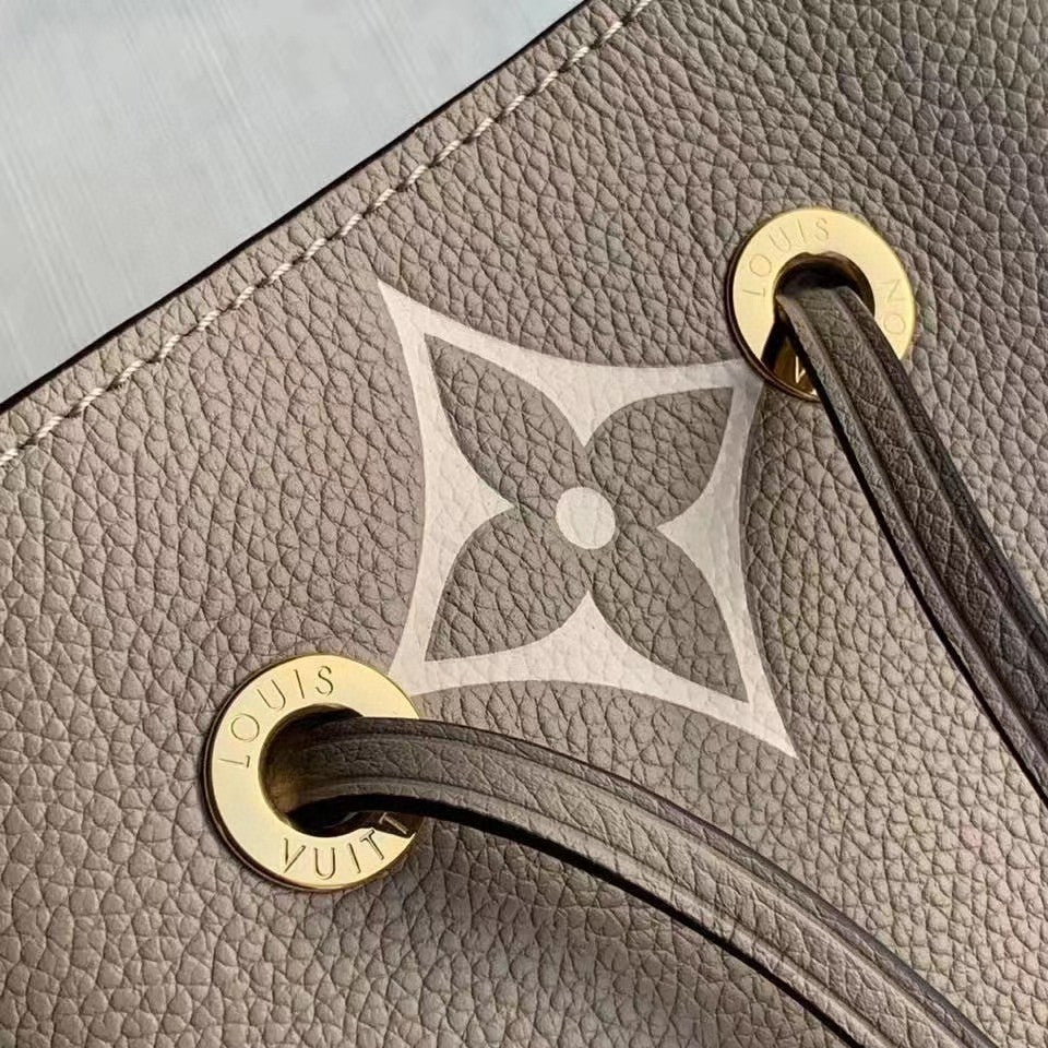 Louis Vuitton Elegant Taupe Monogram Leather Bucket Bag and Matching Pouch Set