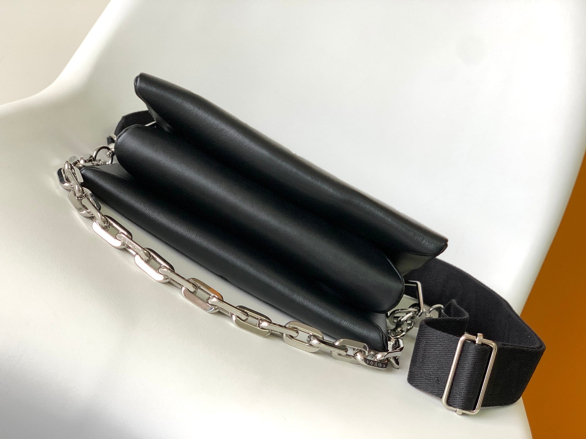 Louis Vuitton Black Embossed Crossbody Bag with Chain and Wide Adjustable Strap