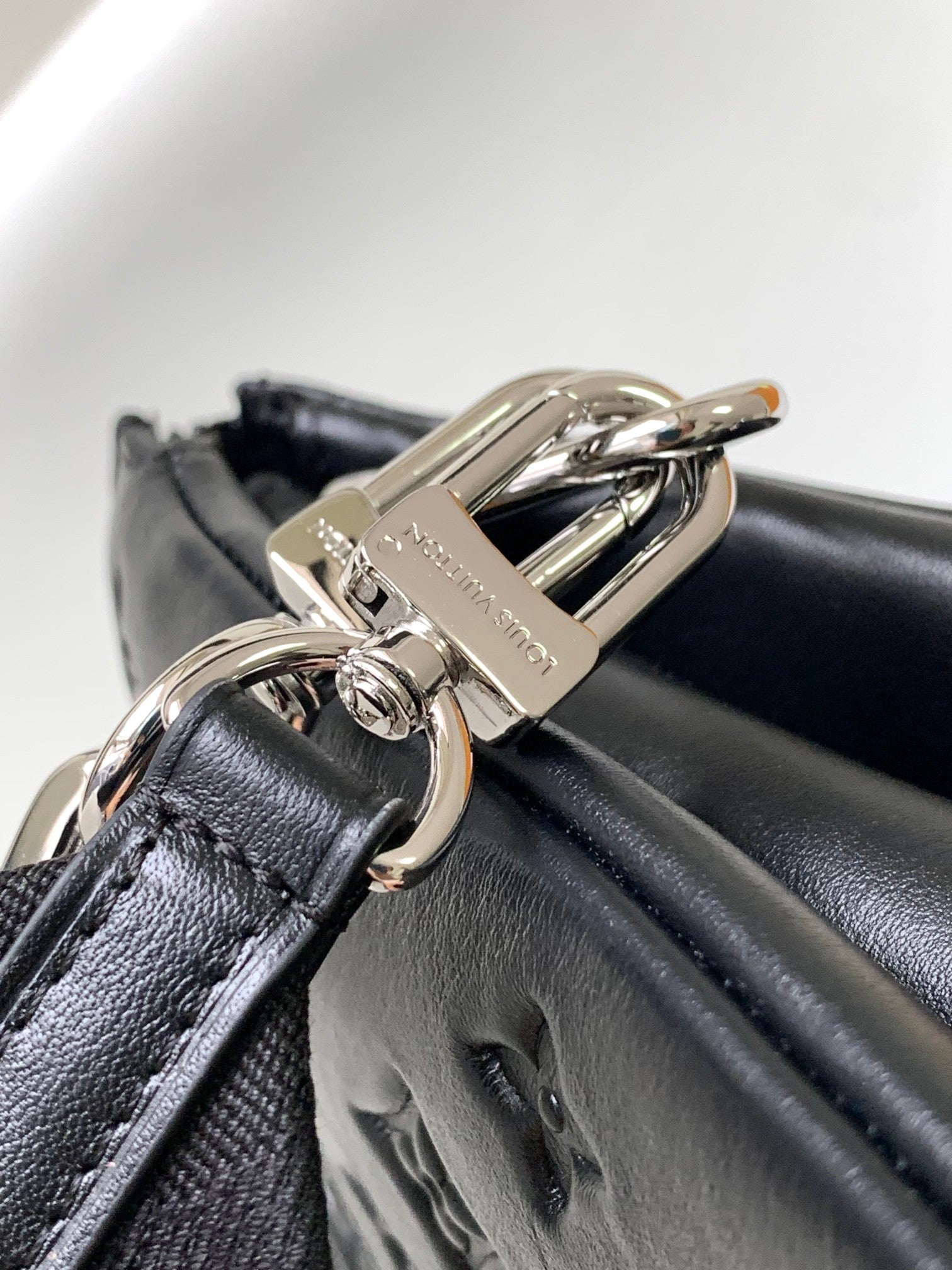 Louis Vuitton Black Embossed Crossbody Bag with Chain and Wide Adjustable Strap