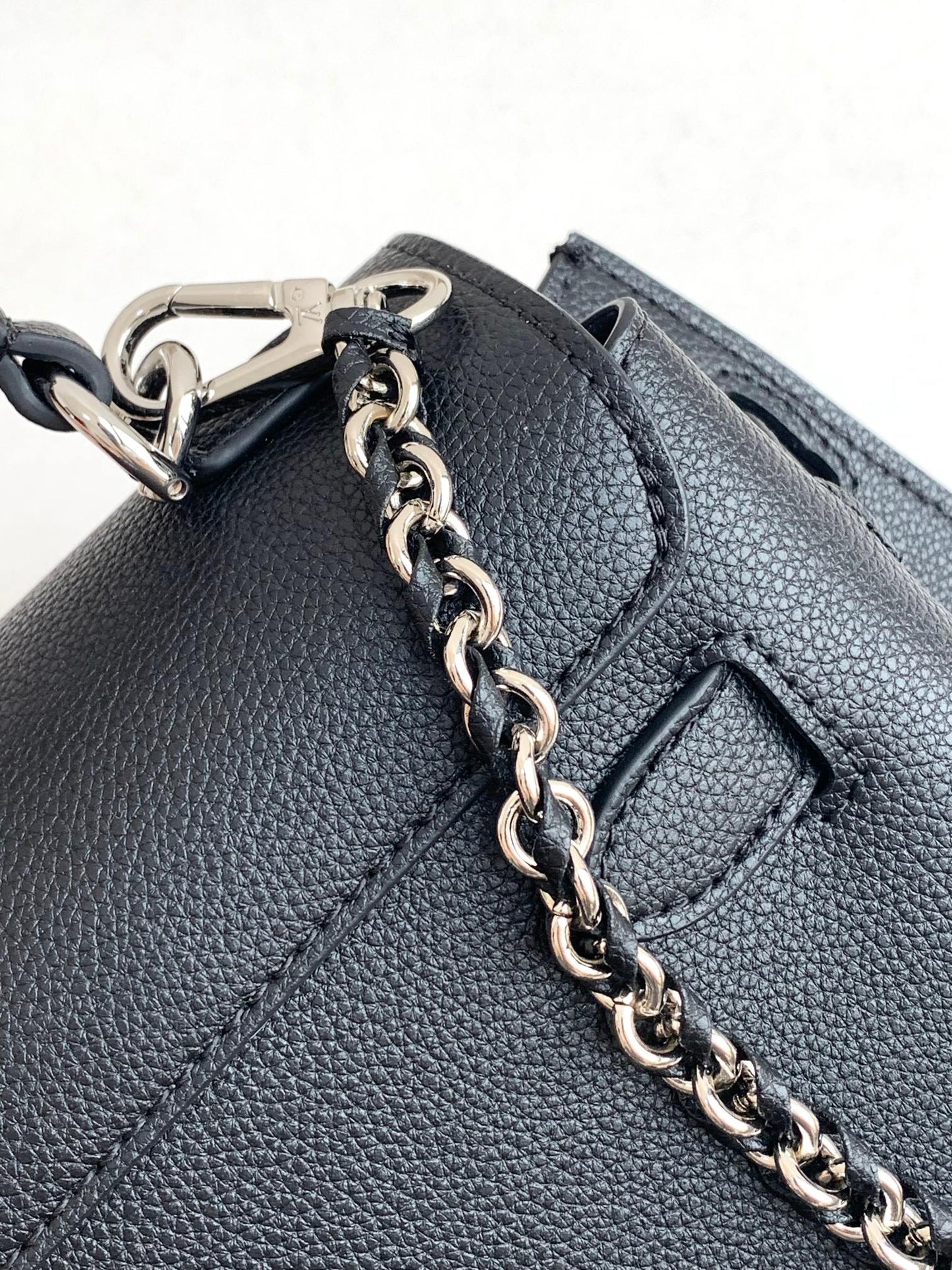 Louis Vuitton Elegant Black Leather Top Handle Handbag with Silver Metal Clasp