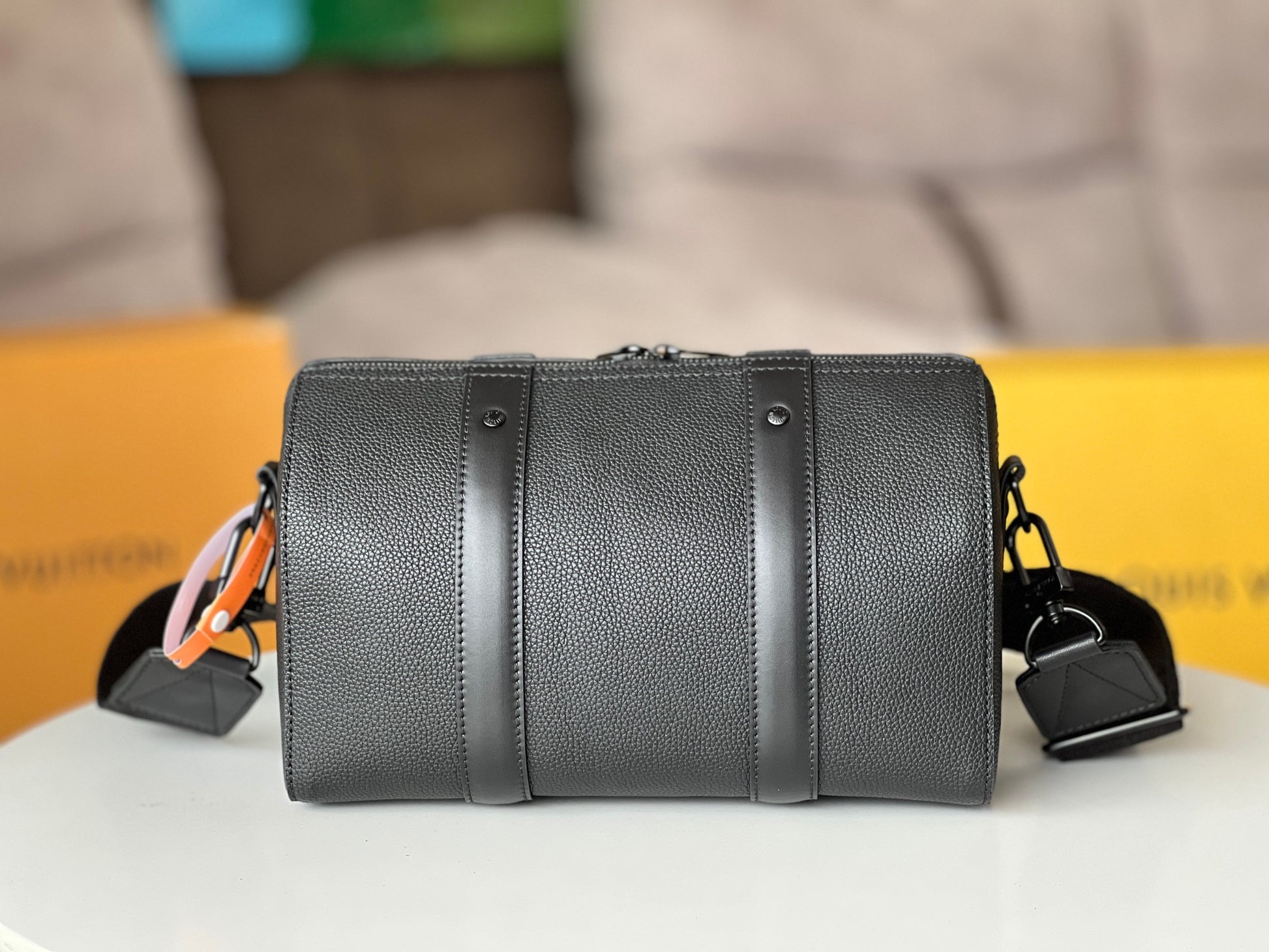 Louis Vuitton Minimalist Black Barrel Crossbody Shoulder Bag with Luggage Tag
