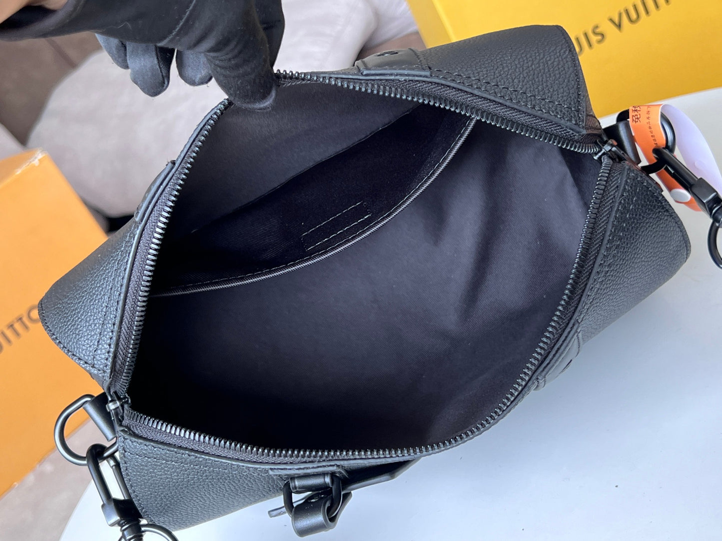 Louis Vuitton Minimalist Black Barrel Crossbody Shoulder Bag with Luggage Tag