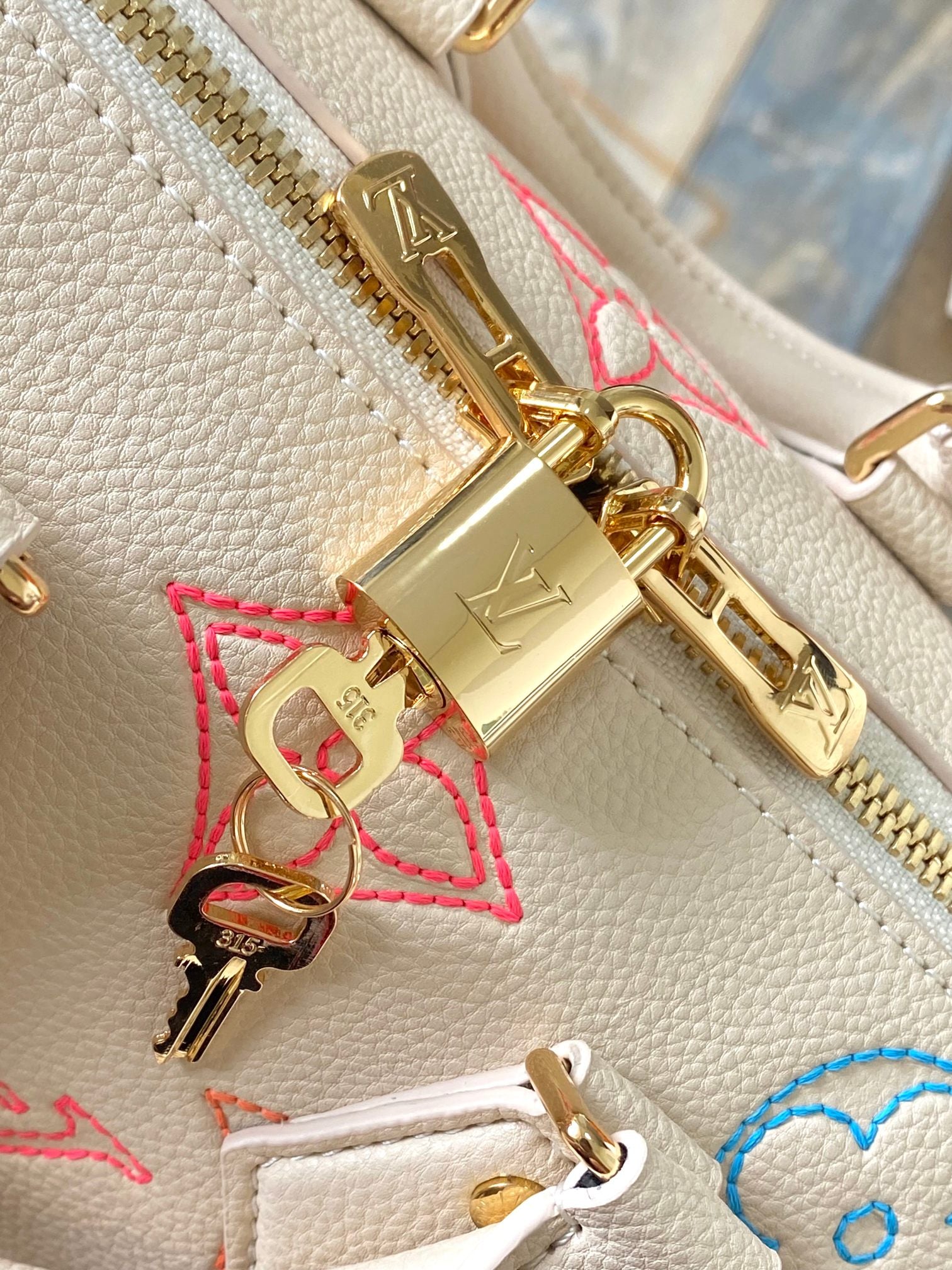 Louis Vuitton Elegant Pastel Pink Leather Monogram Handbag with Chain Strap