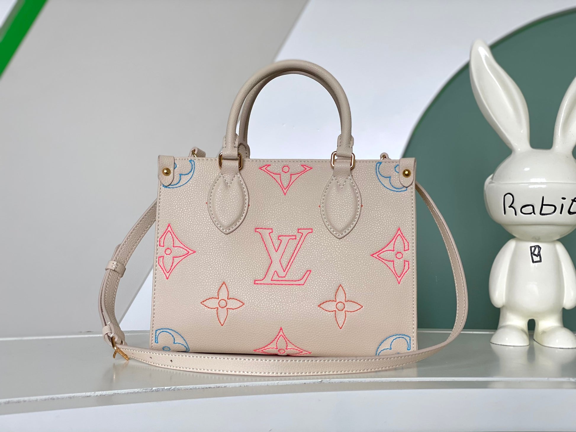 Louis Vuitton Luxury Pastel Pink Leather Tote Bag with Embossed Floral Pattern