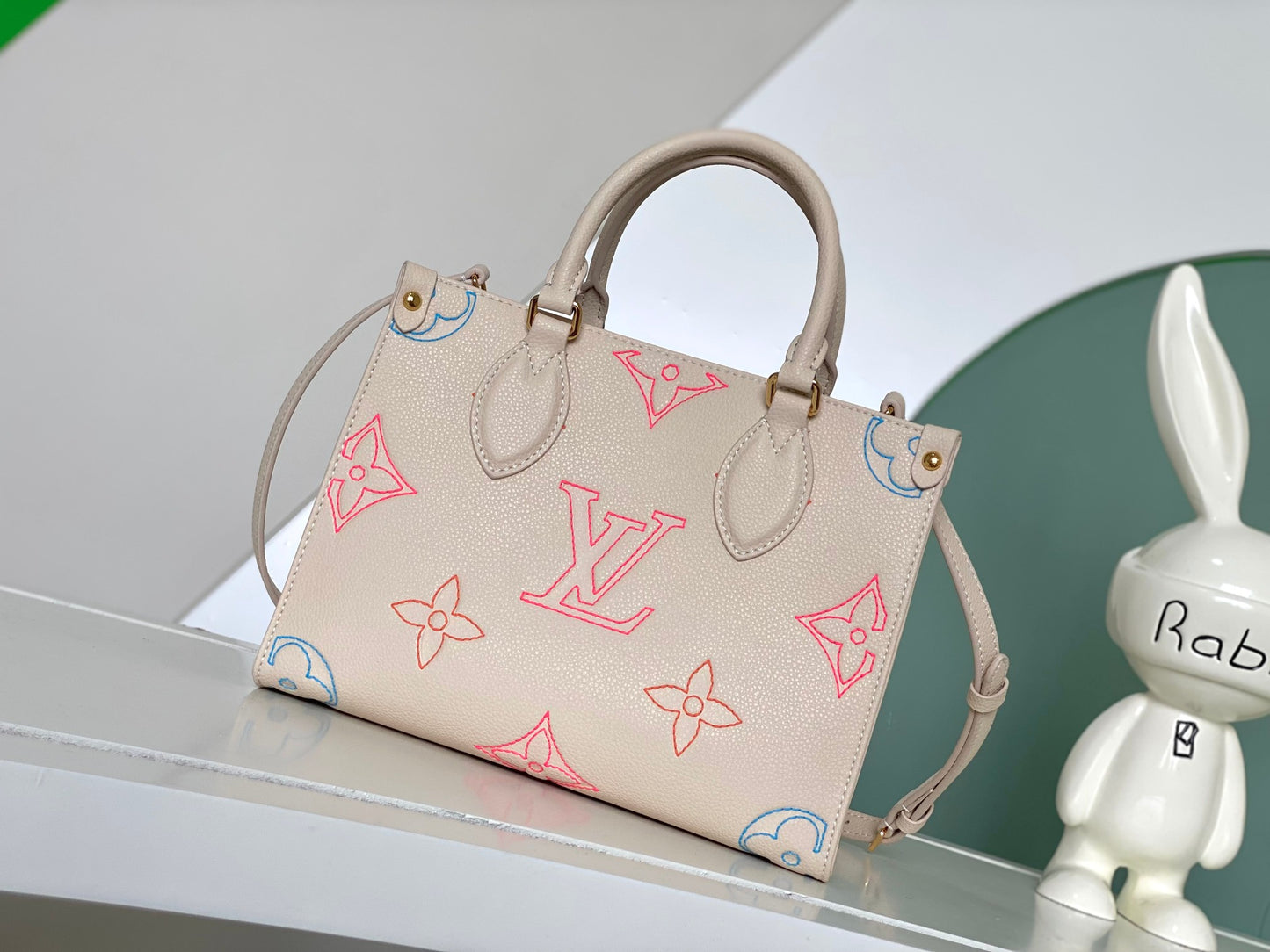 Louis Vuitton Luxury Pastel Pink Leather Tote Bag with Embossed Floral Pattern