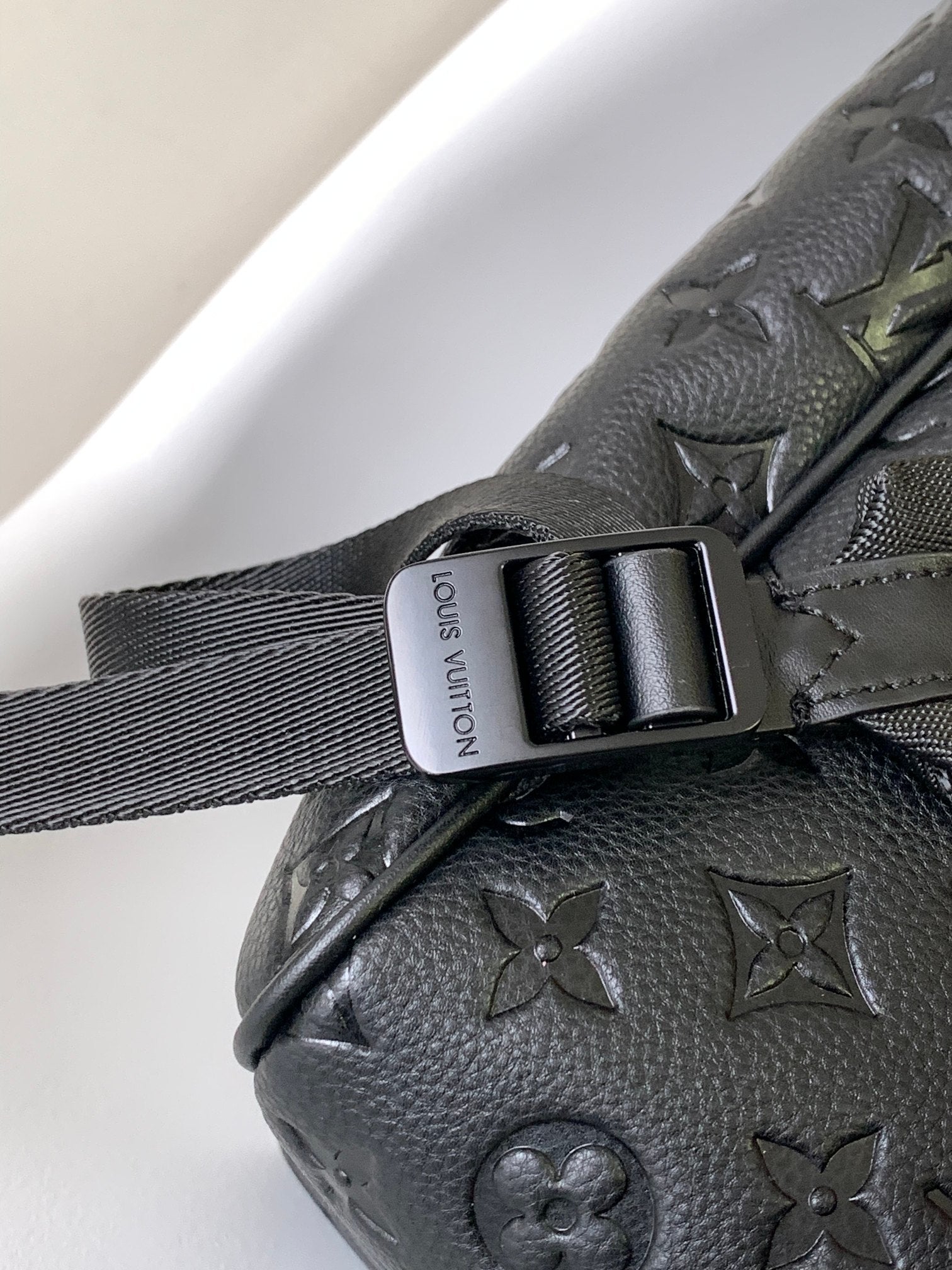 Louis Vuitton Matte Black Embossed Monogram Leather Backpack with Buckle Flap