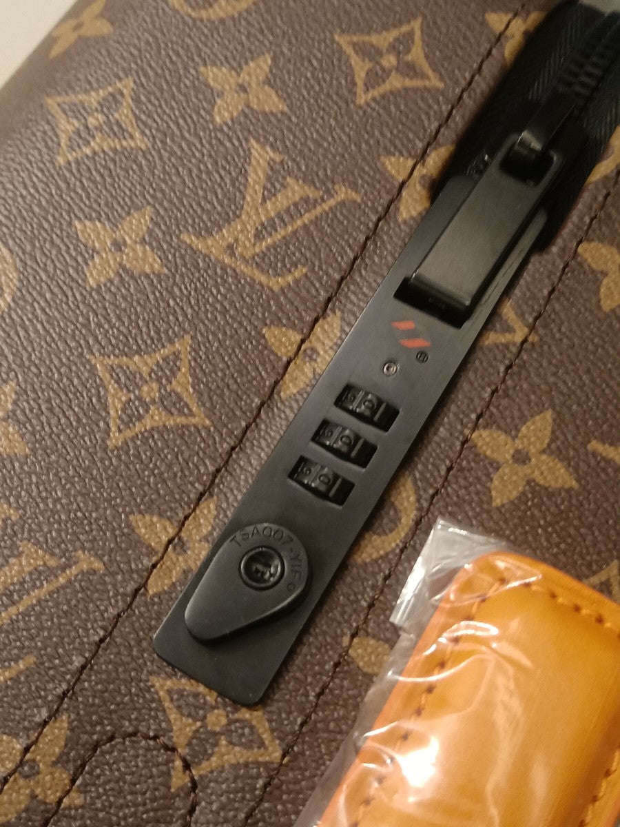 Brown Monogram Pattern Spinner Suitcase with Orange Leather Trim