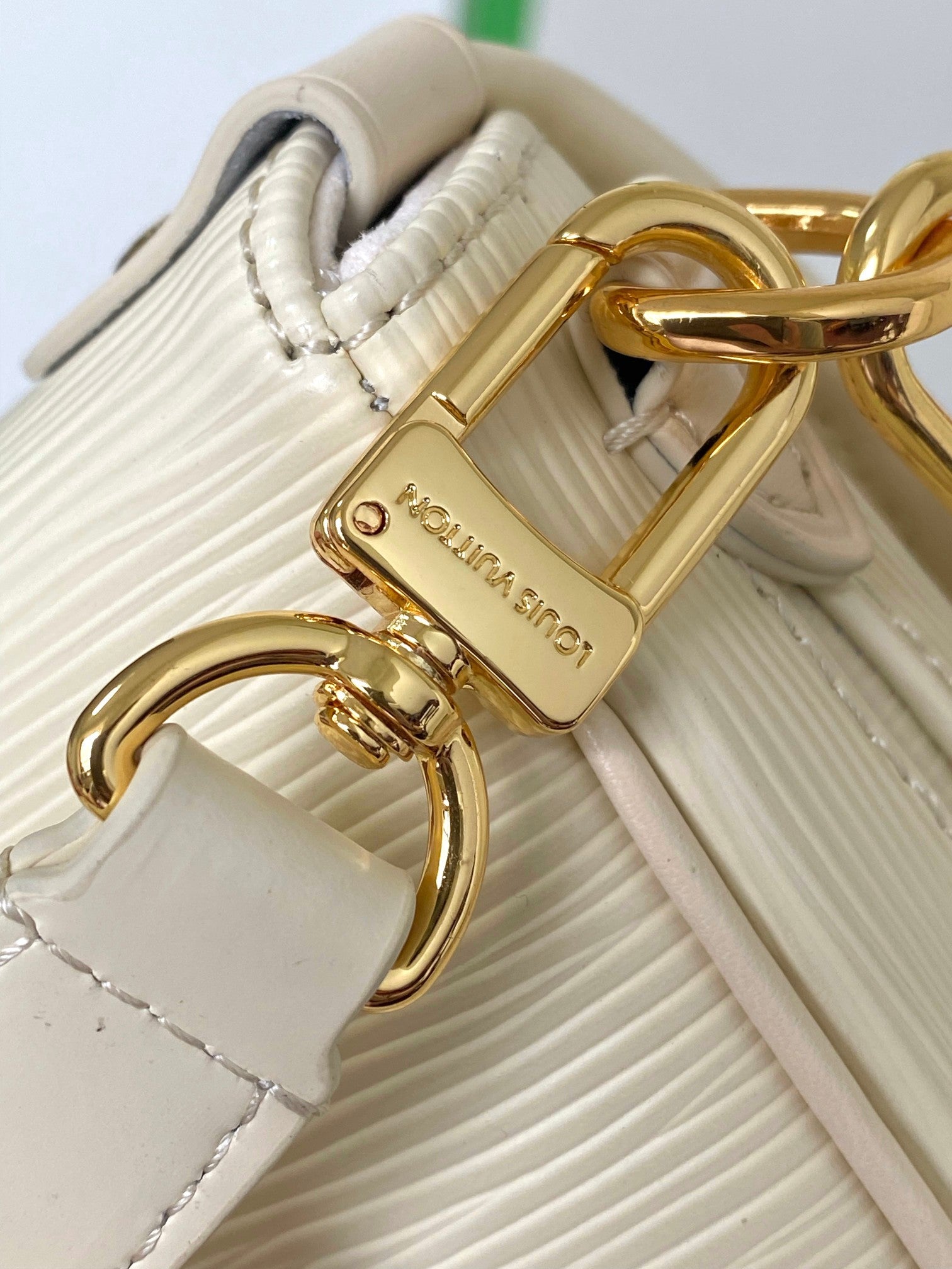 Louis Vuitton Elegant Pale Pink Leather Crossbody Saddle Bag with Gold Hardware