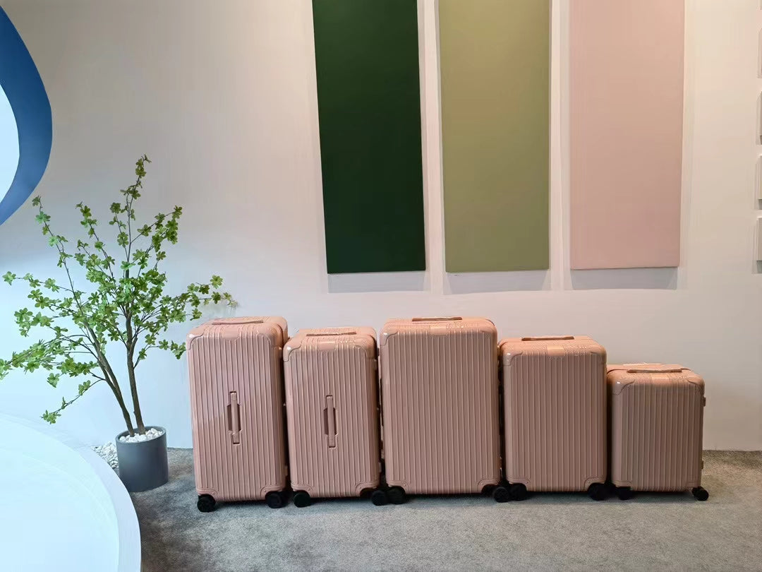 Pastel Pink Ribbed Hardshell Spinner Suitcase Luggage Set