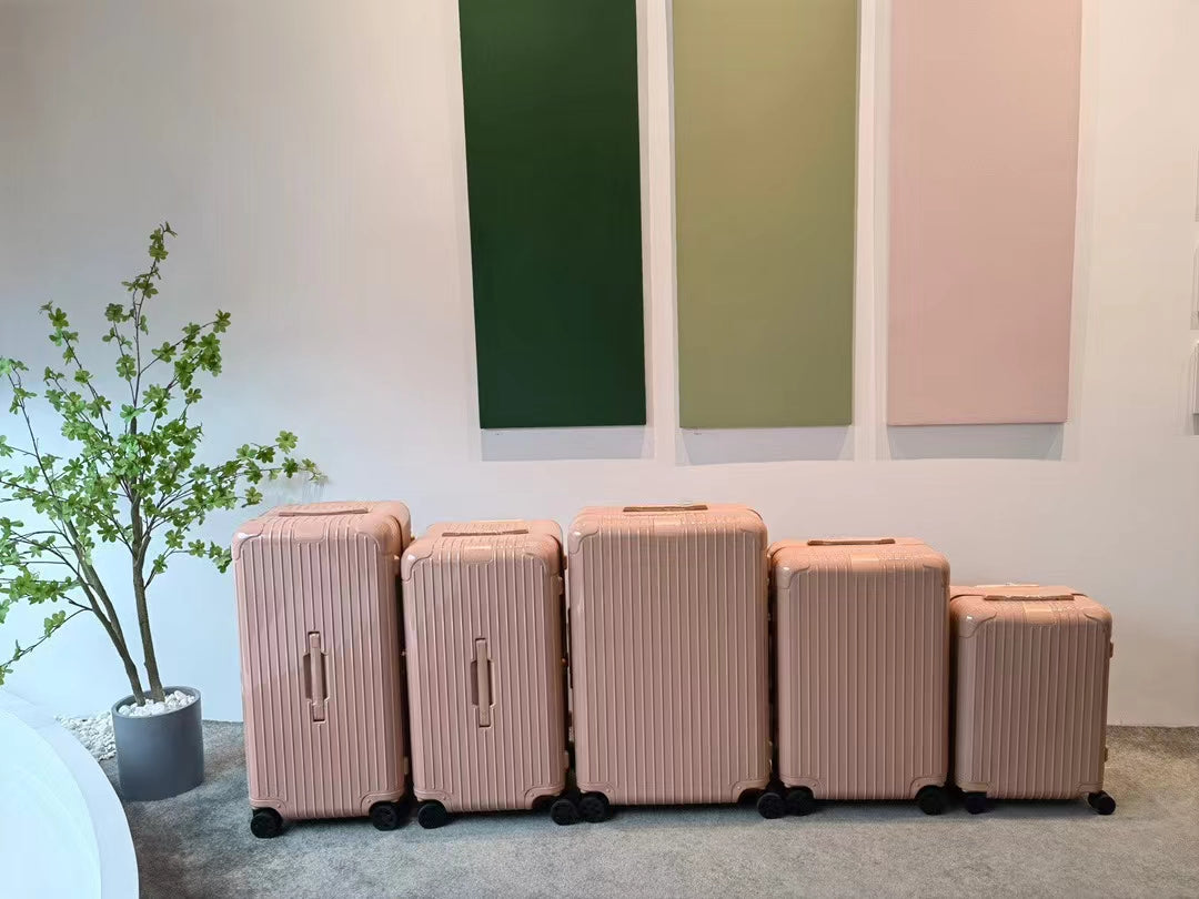 Pastel Pink Ribbed Hardshell Spinner Suitcase Luggage Set