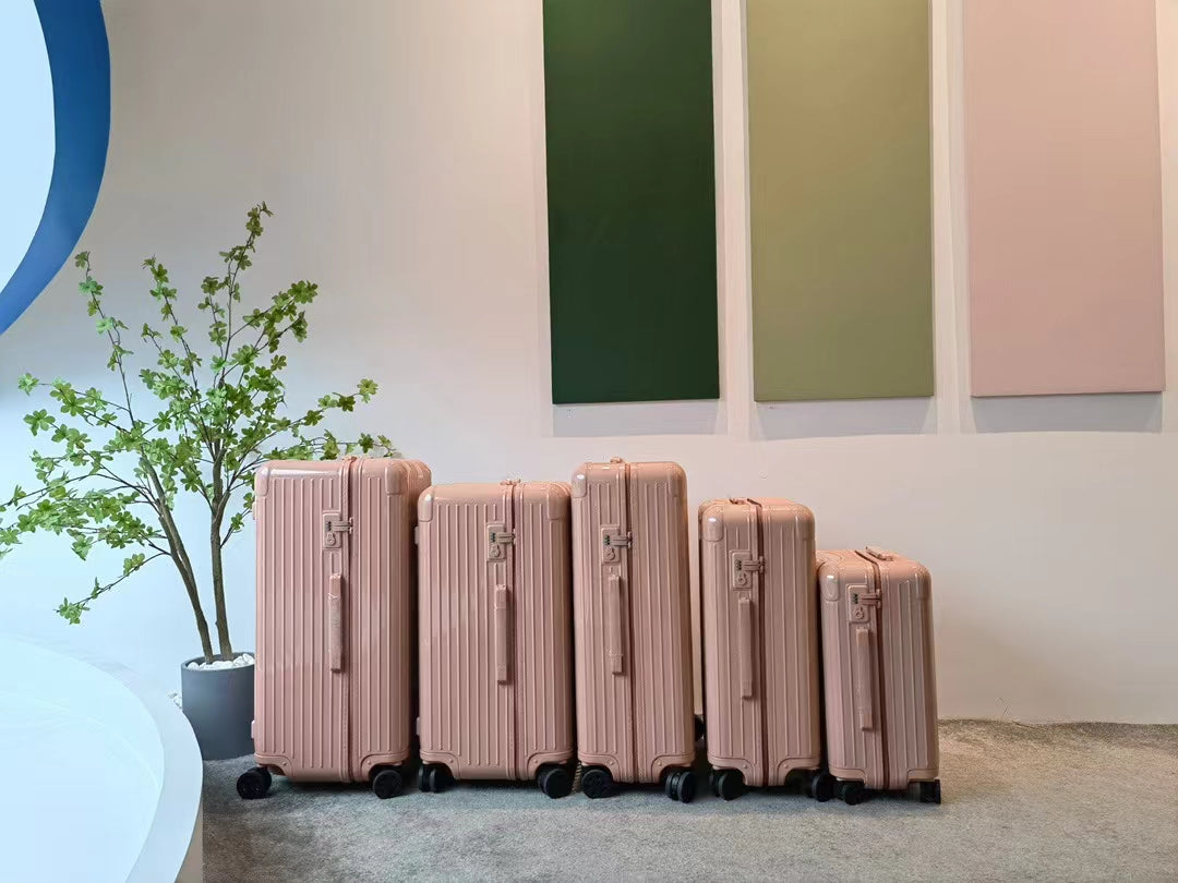 Pastel Pink Ribbed Hardshell Spinner Suitcase Luggage Set