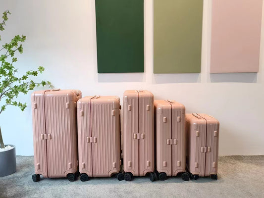 Pastel Pink Ribbed Hardshell Spinner Suitcase Luggage Set