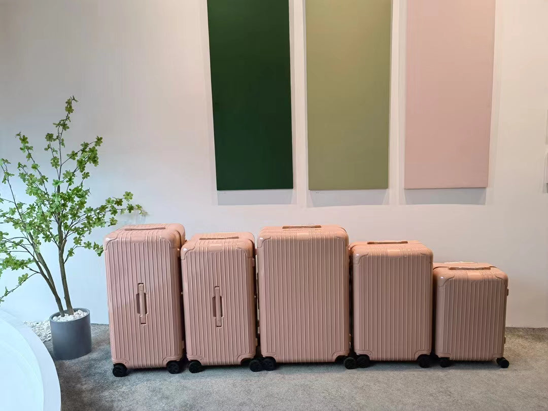 Pastel Pink Ribbed Hardshell Spinner Suitcase Luggage Set