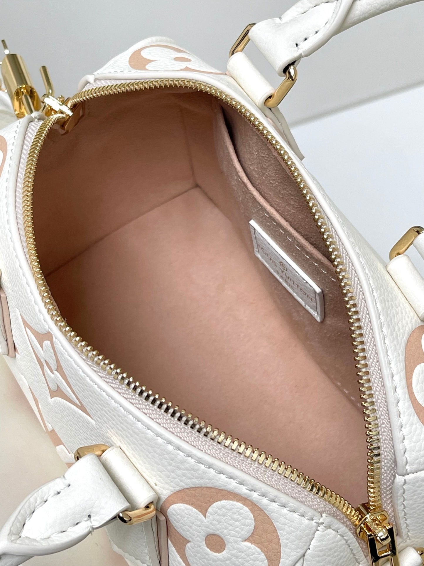 Louis Vuitton Elegant Beige Embossed Leather Mini Crossbody Bag with Top Handle