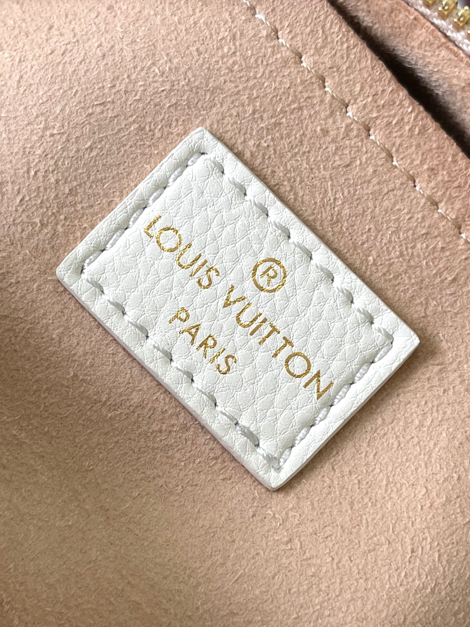 Louis Vuitton Elegant Beige Embossed Leather Mini Crossbody Bag with Top Handle